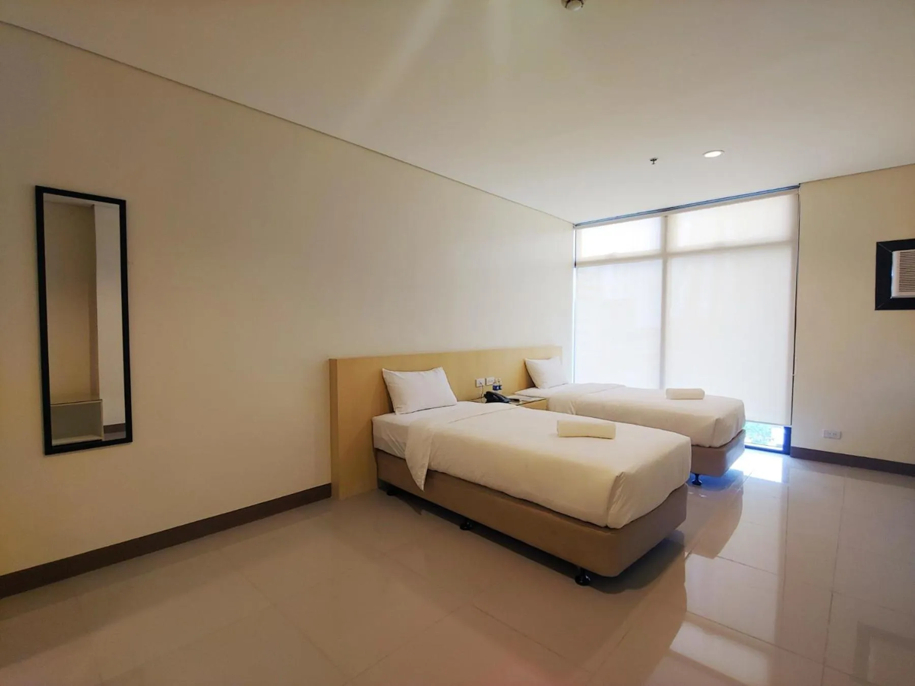 Bed in Kaizen Suites