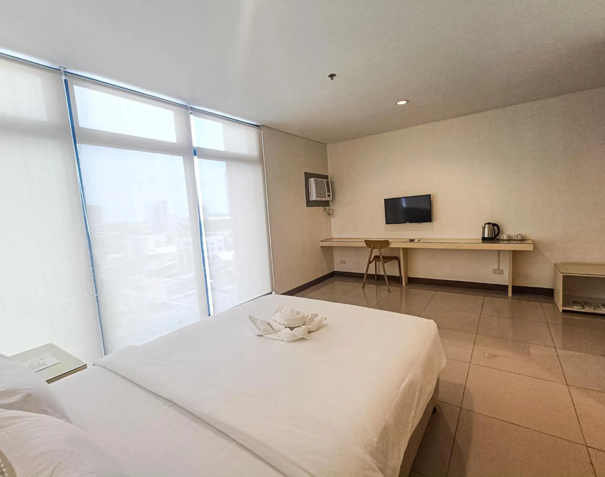 Bed in Kaizen Suites