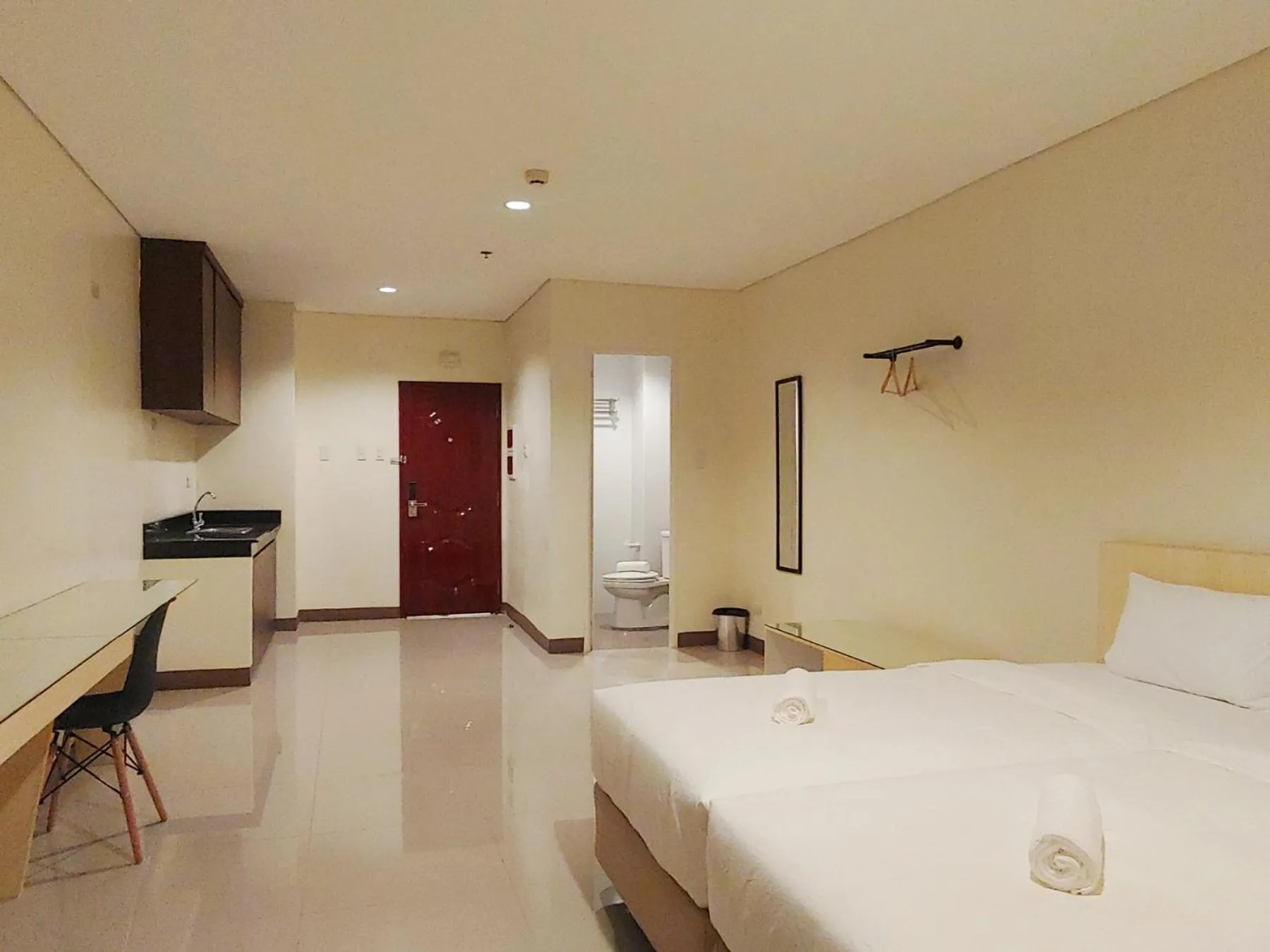 Photo of the whole room, Bed in Kaizen Suites