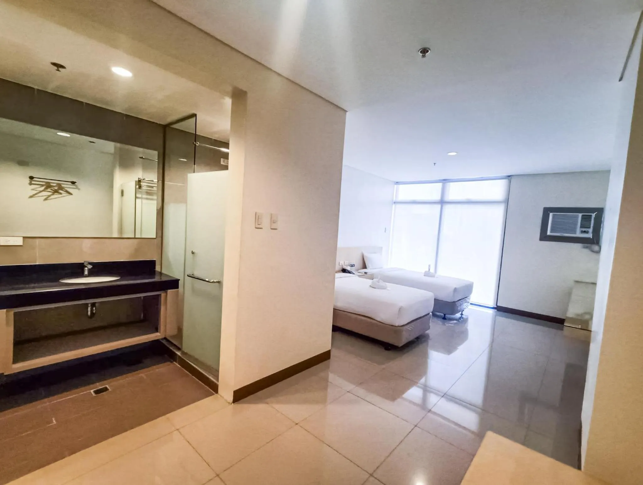 Bathroom, Bed in Kaizen Suites