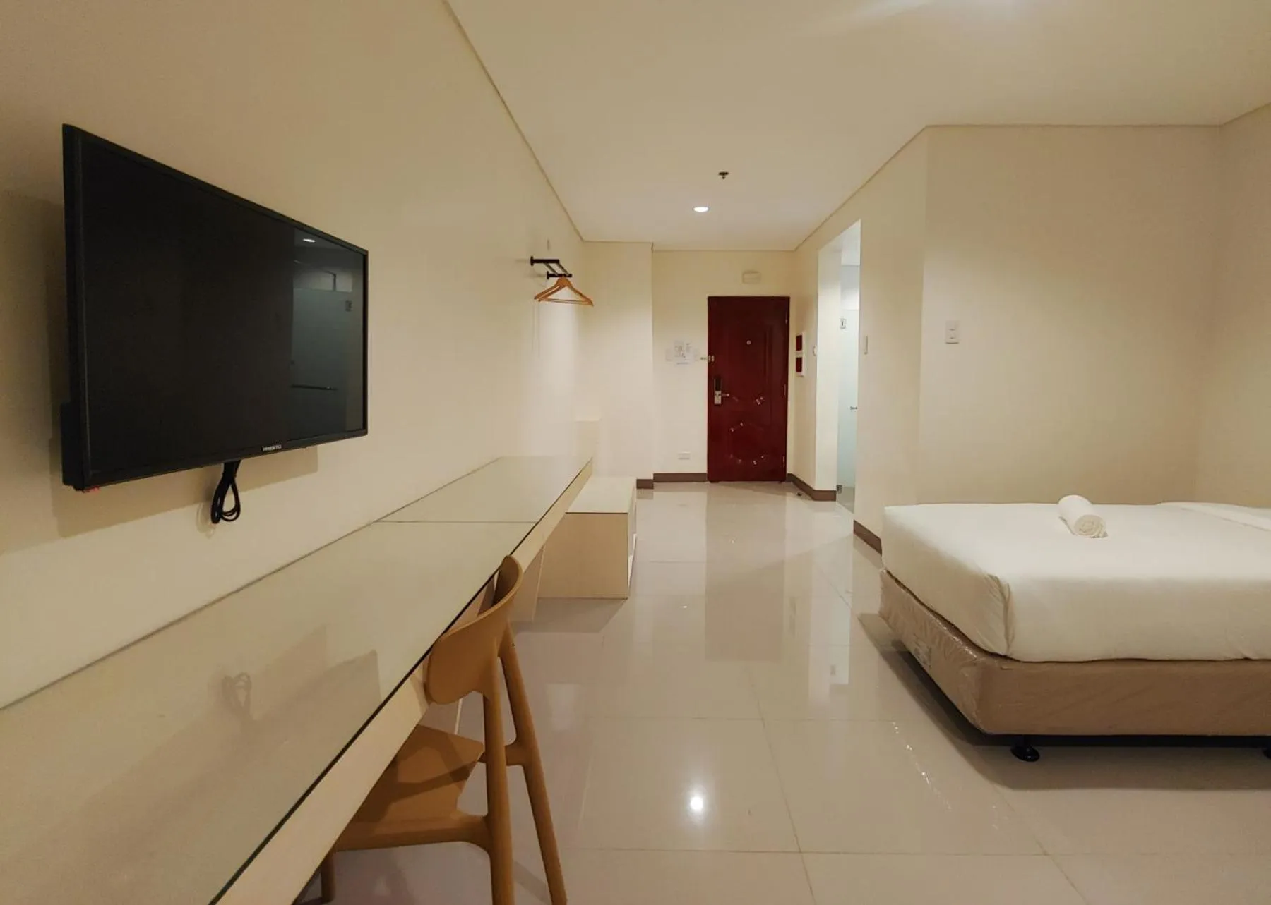 Photo of the whole room, Bed in Kaizen Suites