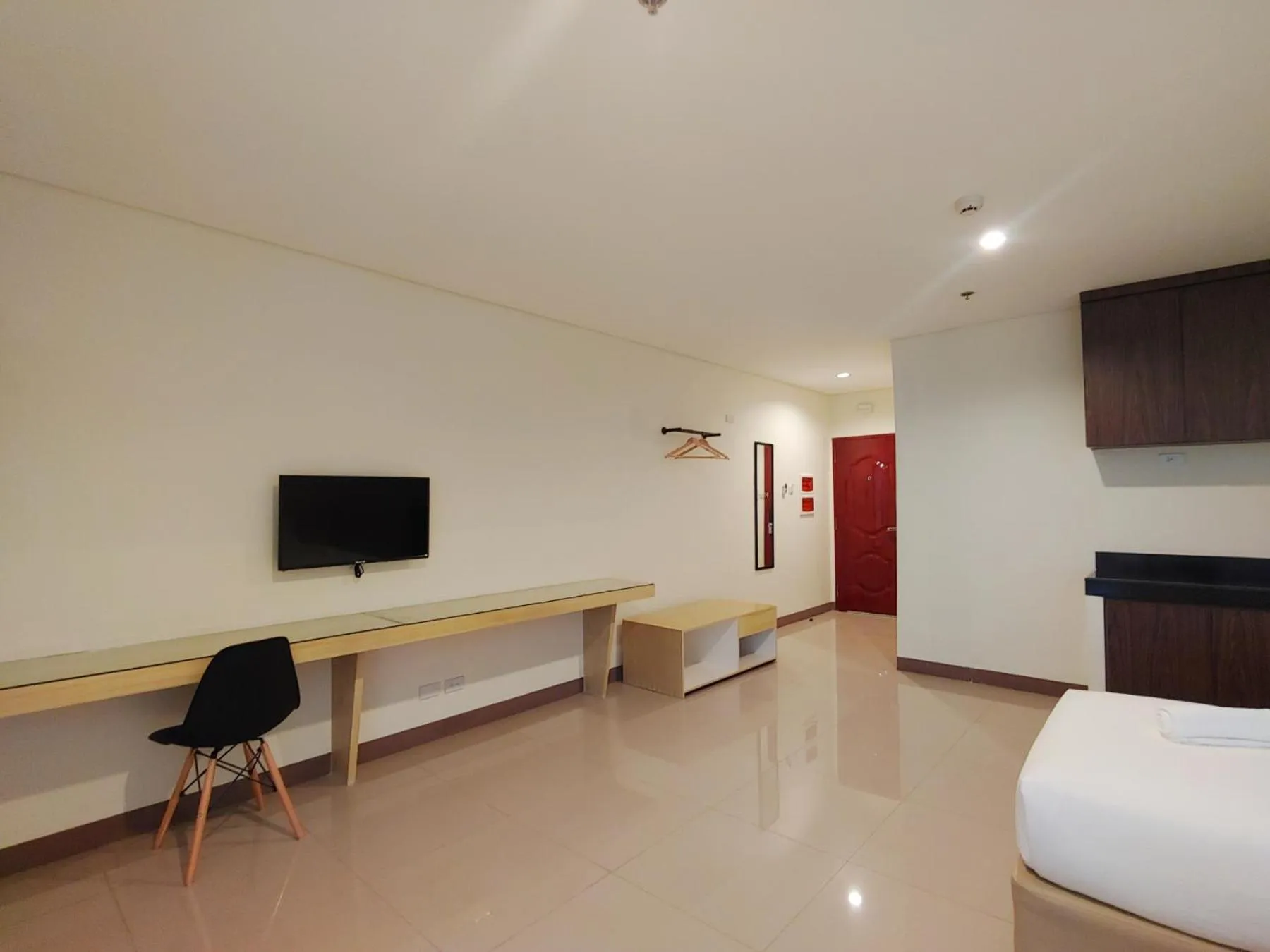 Photo of the whole room, Bed in Kaizen Suites