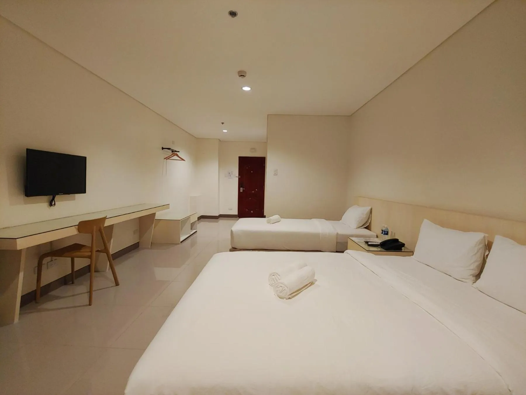 Photo of the whole room, Bed in Kaizen Suites