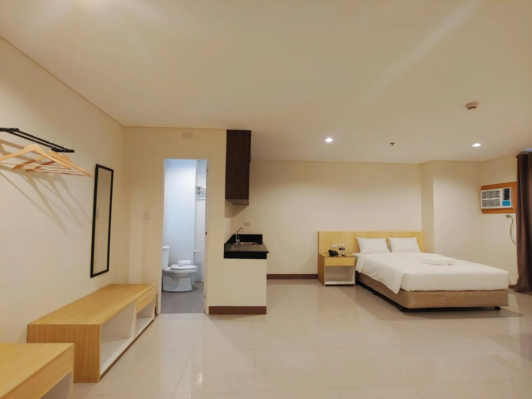 Photo of the whole room, Bed in Kaizen Suites