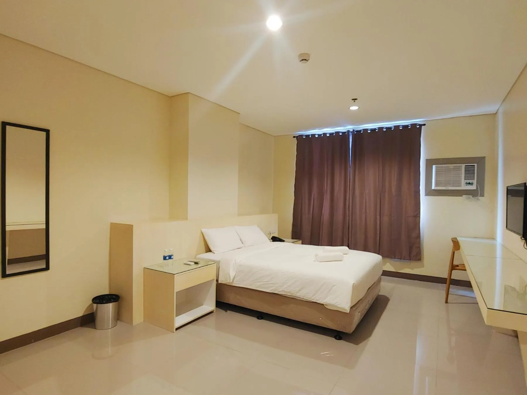Photo of the whole room, Bed in Kaizen Suites