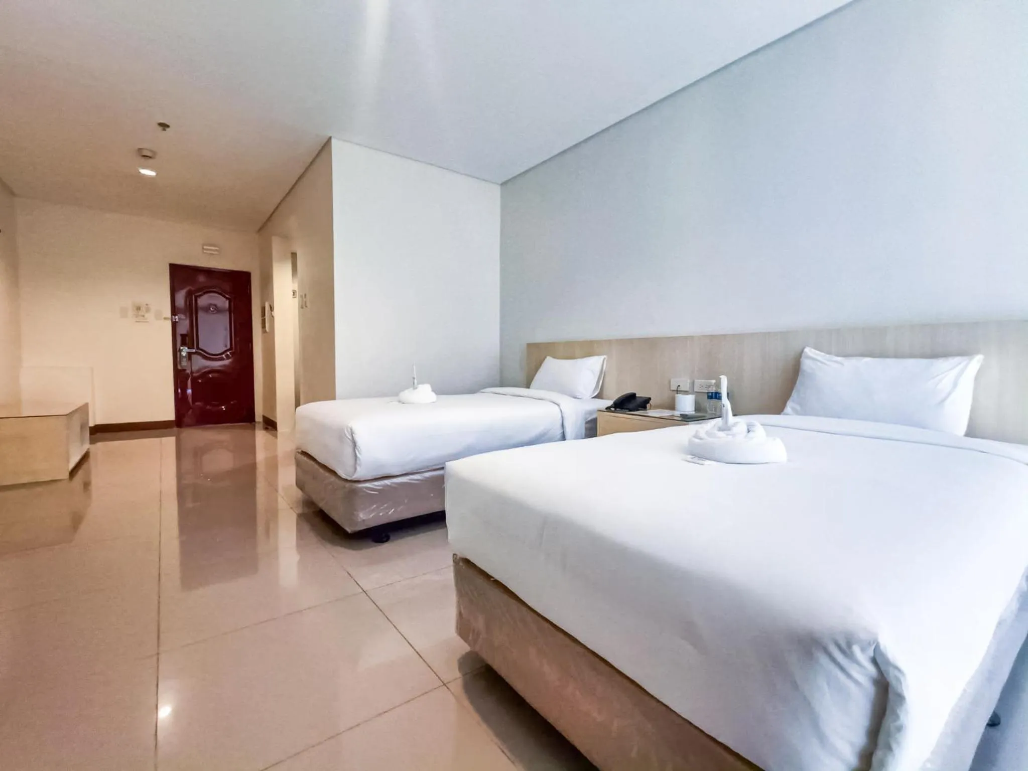 Bed in Kaizen Suites