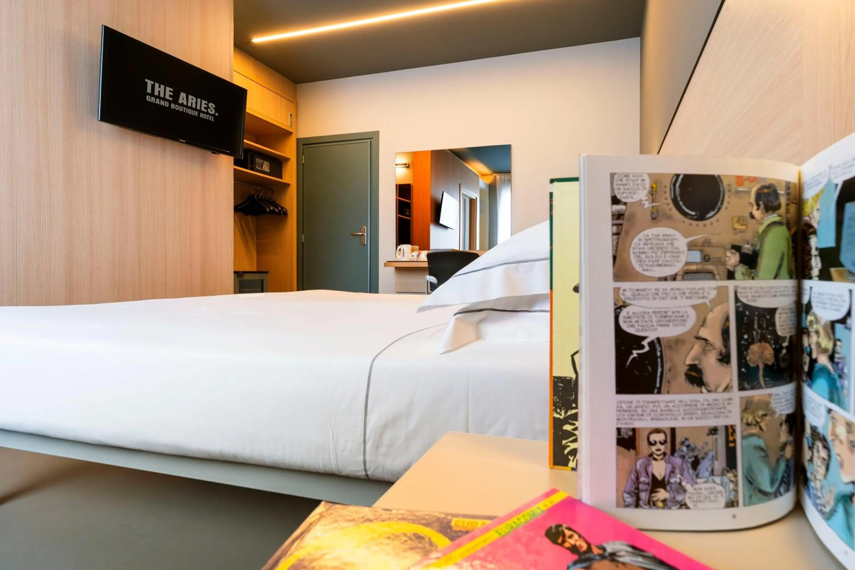 Bed in The Aries Hotel