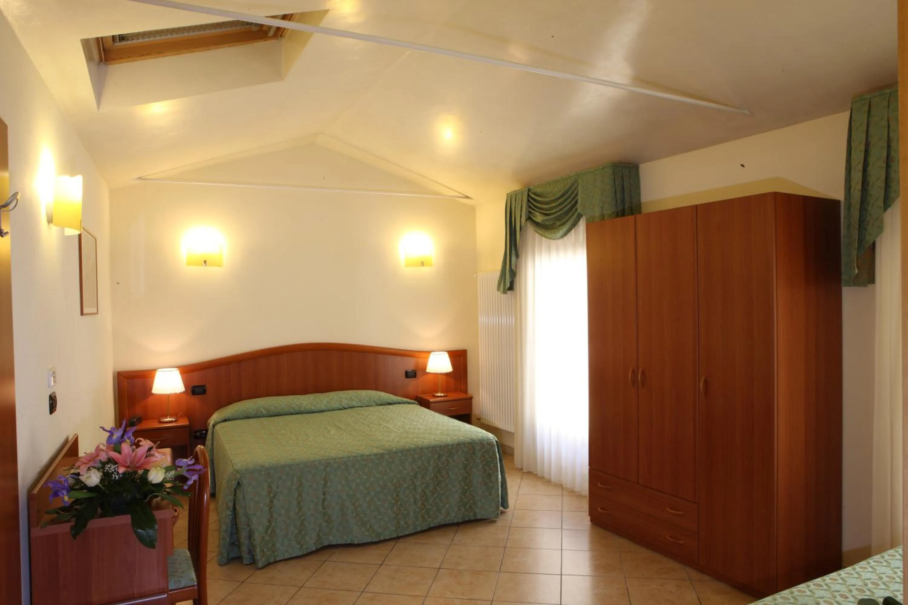 Bed in Albergo Alla Campana