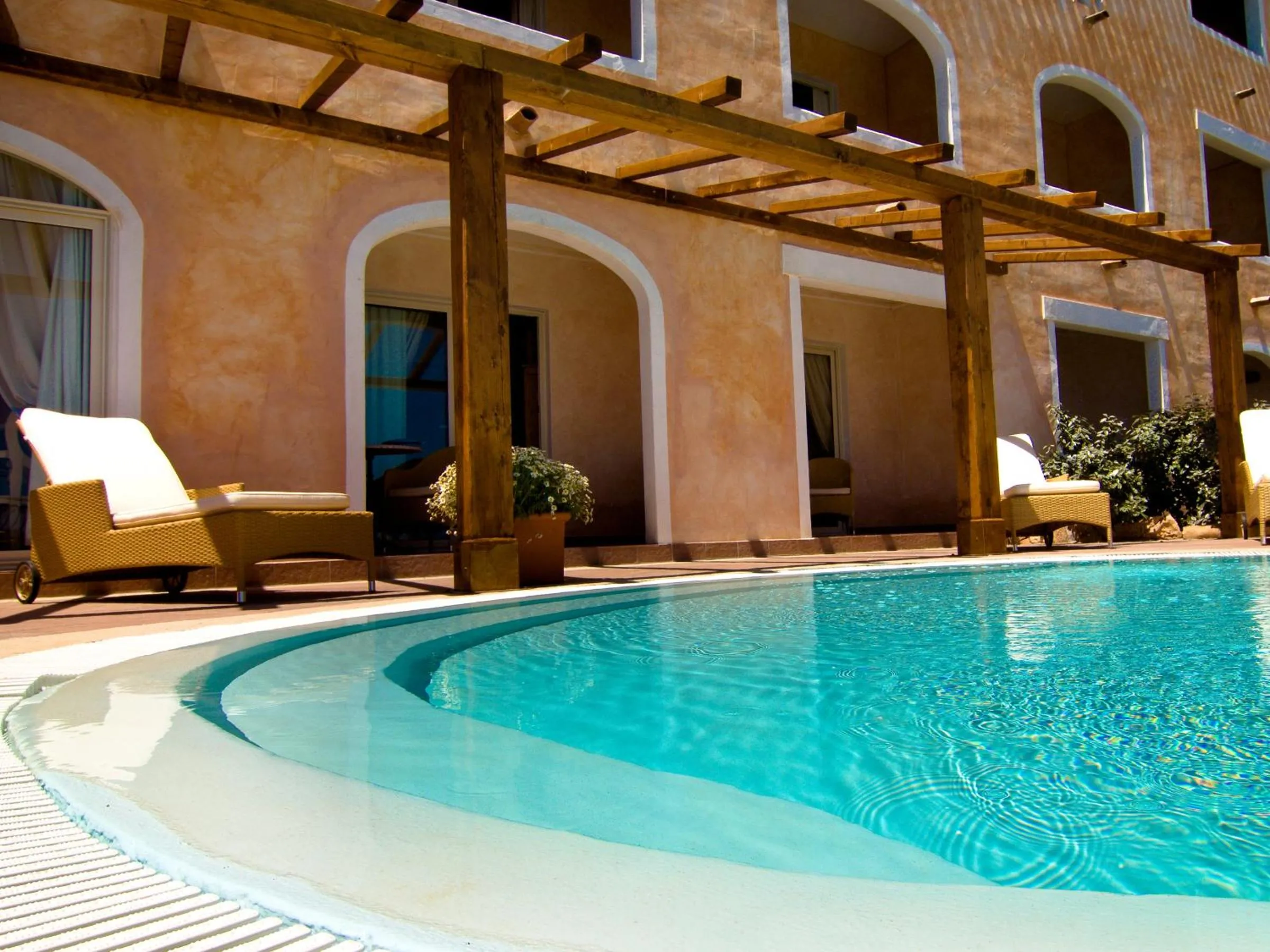 Property building in COLONNA RESORT, a Colonna Luxury Beach Hotel, Porto Cervo