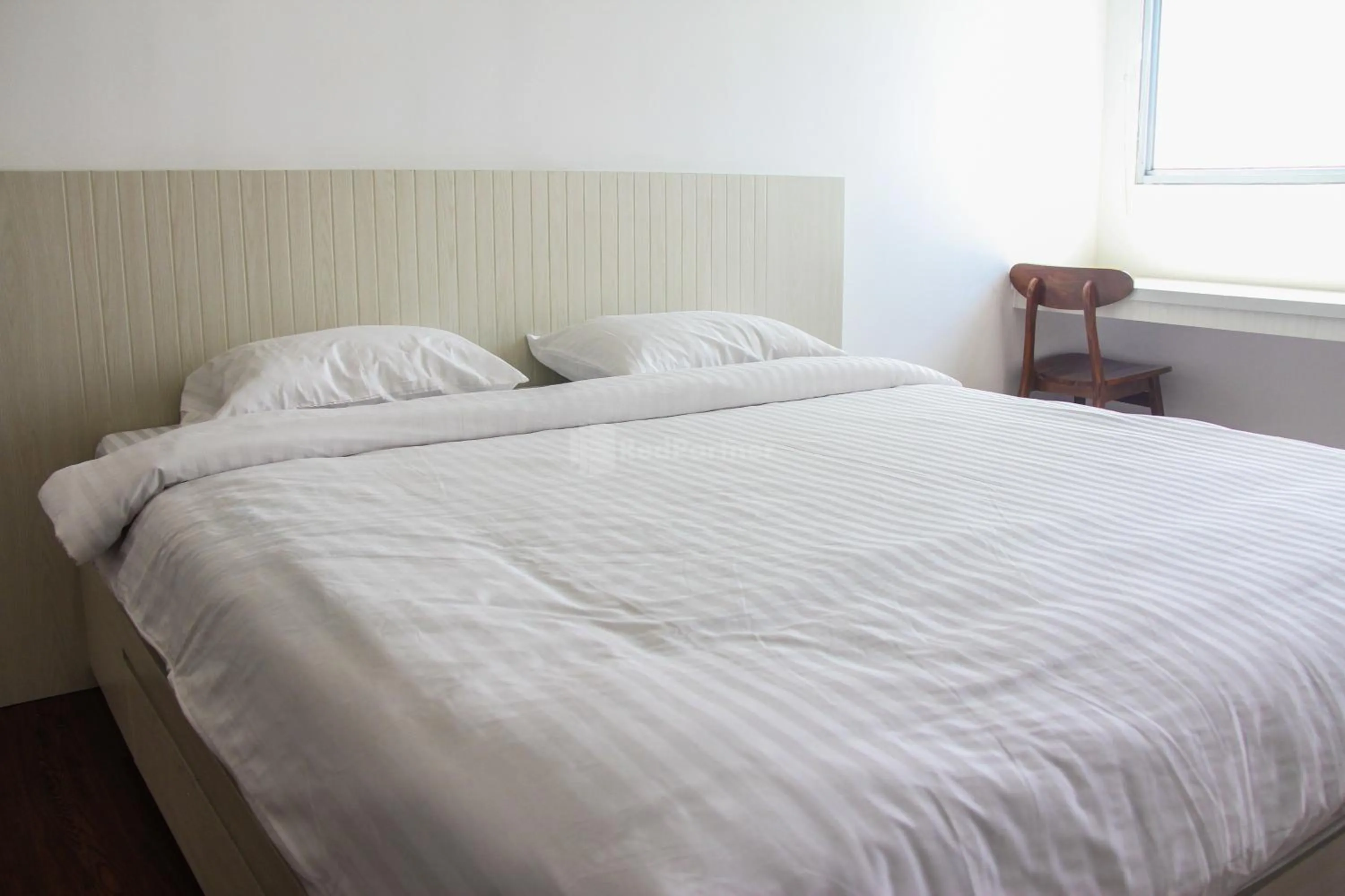 Bedroom in RedLiving Apartemen Gunung Putri Square - Abidin Room Tower Pinus