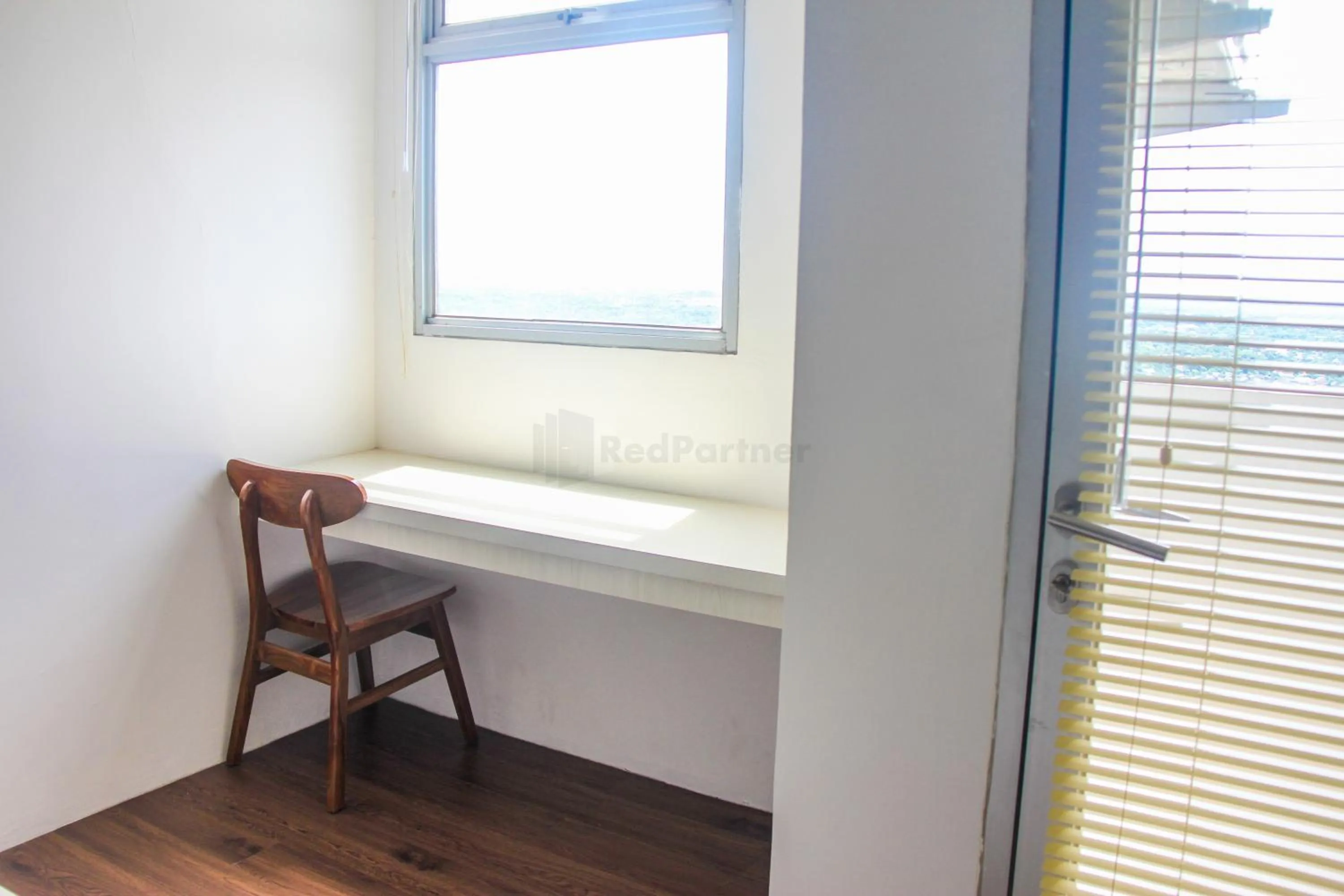 Bedroom in RedLiving Apartemen Gunung Putri Square - Abidin Room Tower Pinus