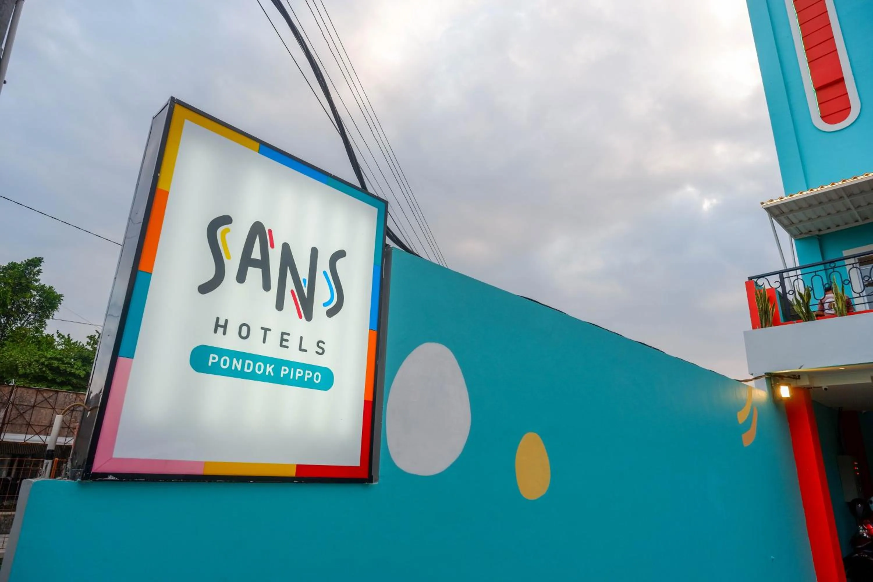 Property logo or sign in Sans Hotel Pippo Yogyakarta by RedDoorz