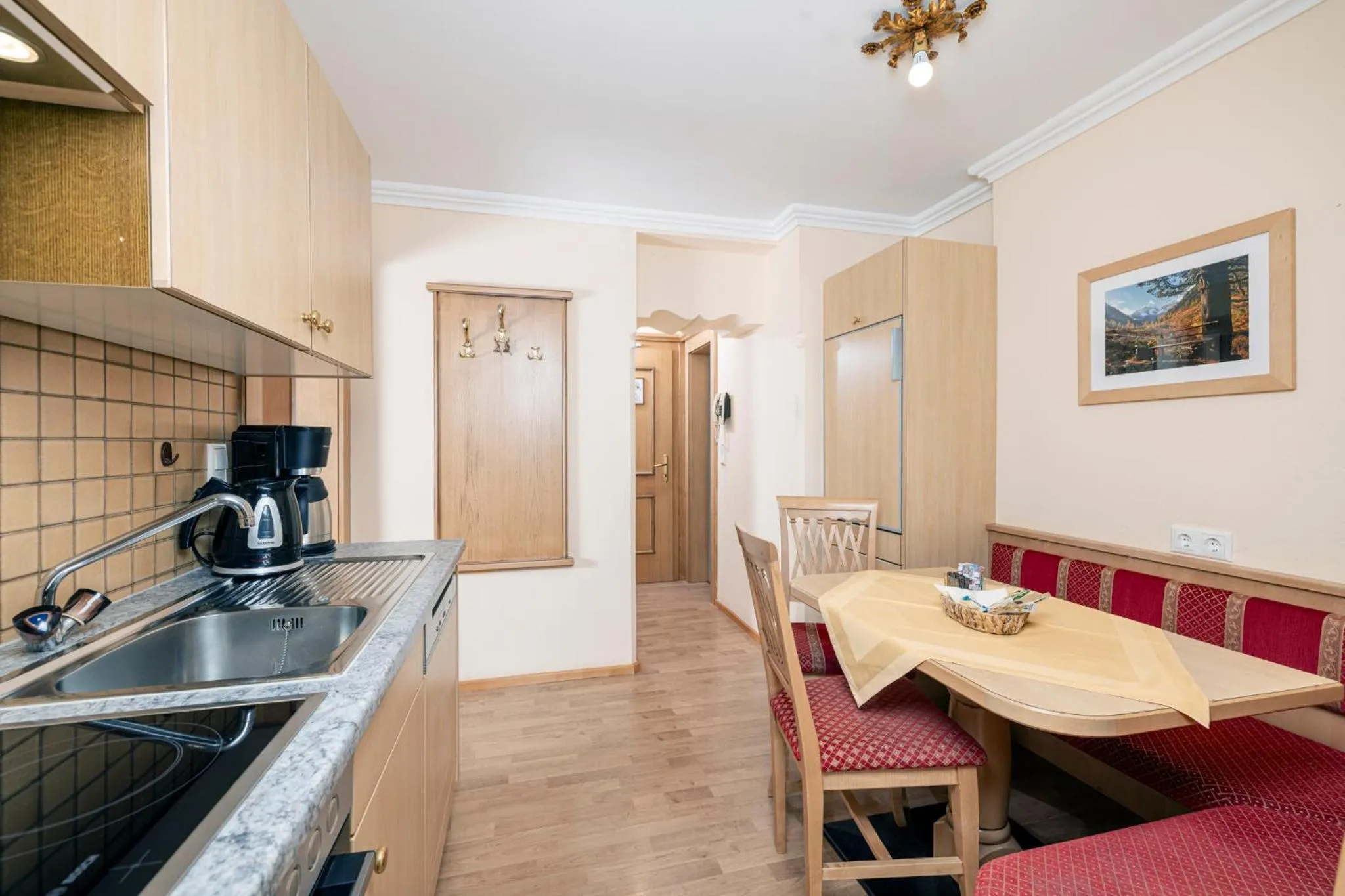 Kitchen or kitchenette in Aparthotel Landhaus St. Joseph (Indoor Pool)