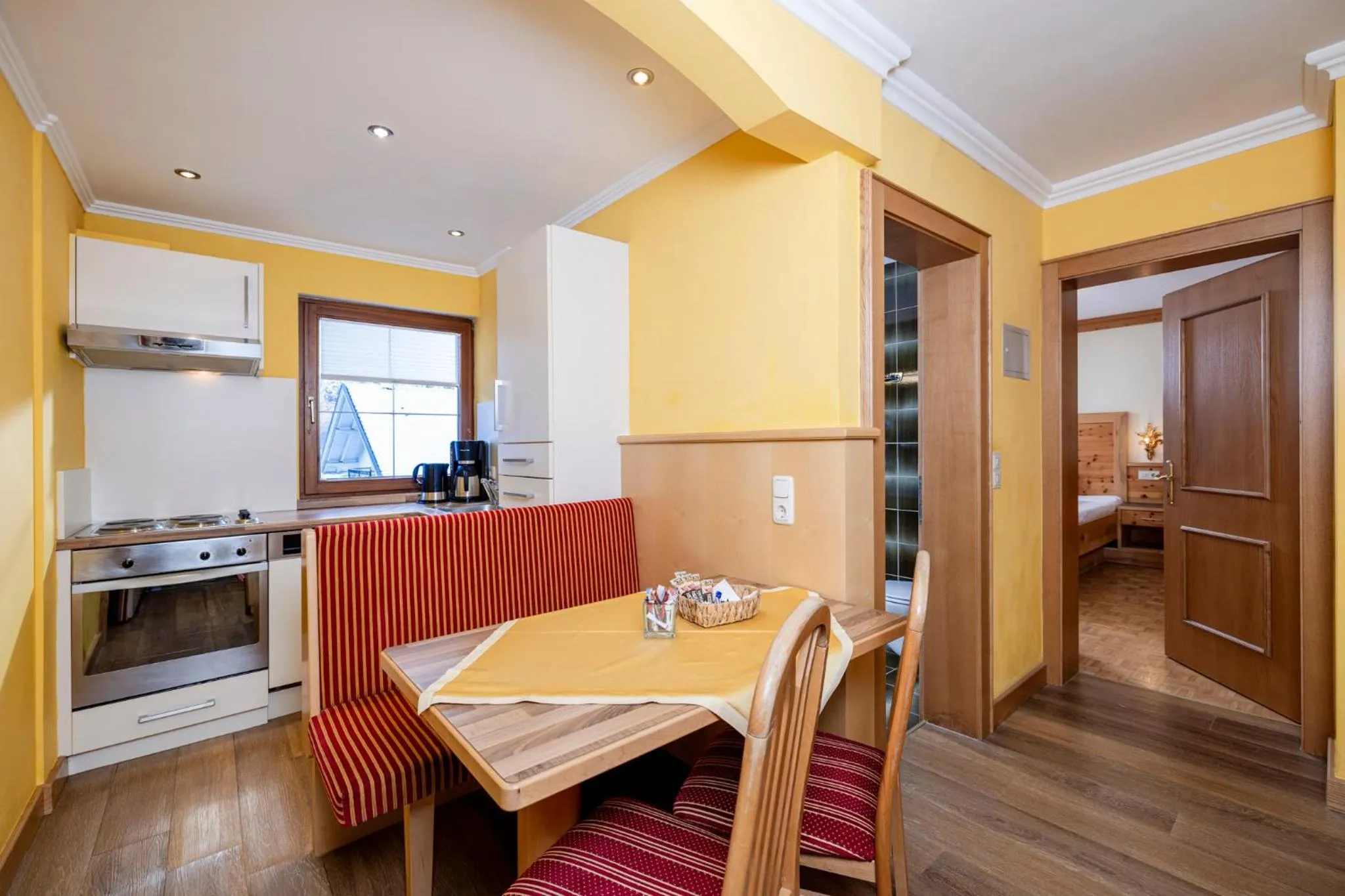 Kitchen or kitchenette in Aparthotel Landhaus St. Joseph (Indoor Pool)