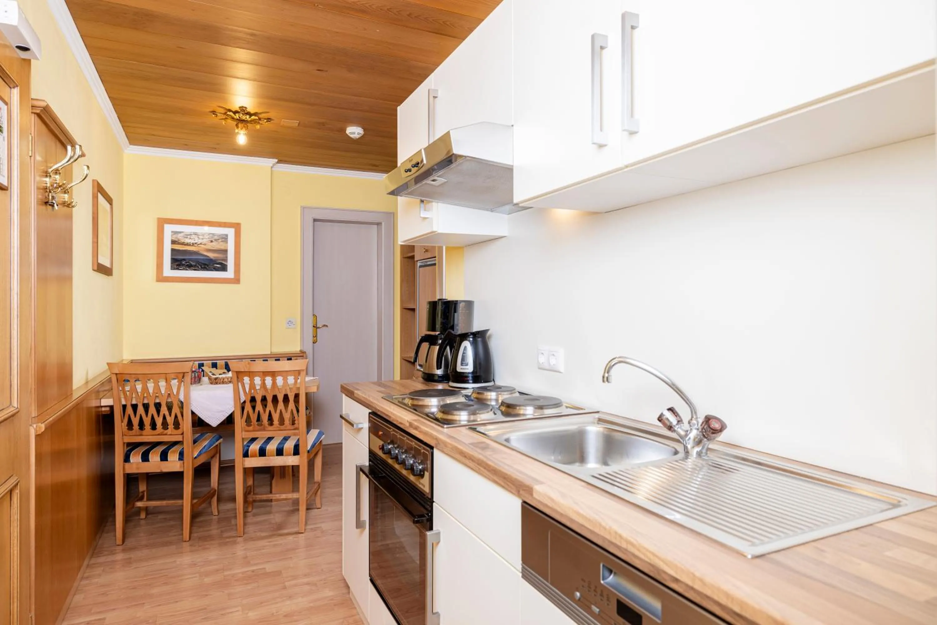 Kitchen or kitchenette in Aparthotel Landhaus St. Joseph (Indoor Pool)