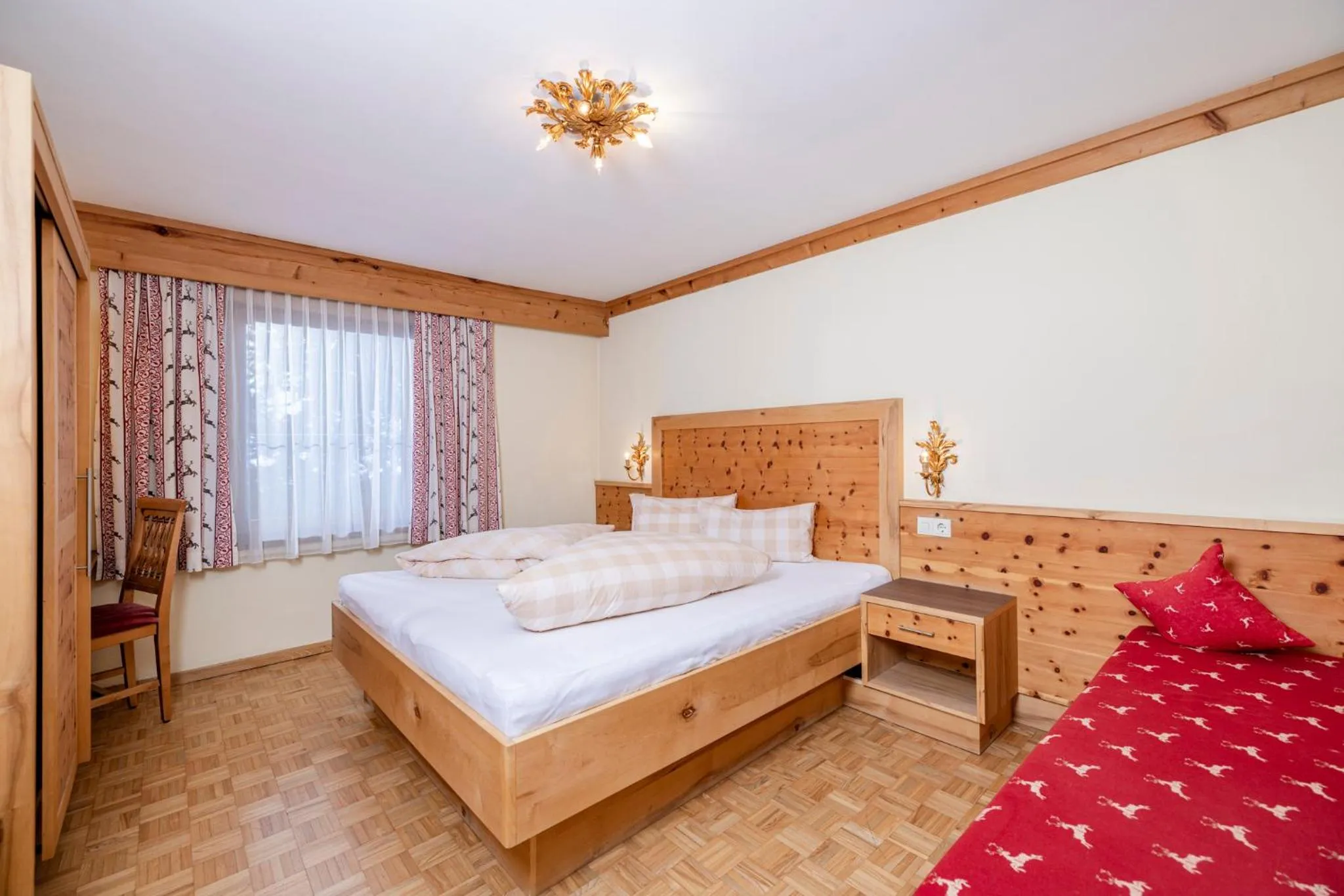 Photo of the whole room, Bed in Aparthotel Landhaus St. Joseph (Indoor Pool)