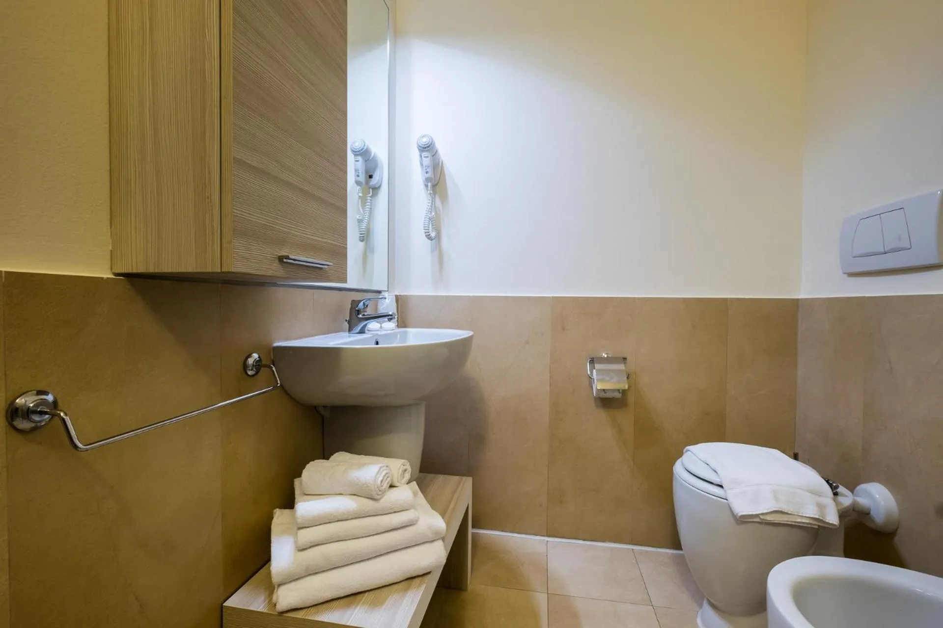 Bathroom in Canado Family Hotel