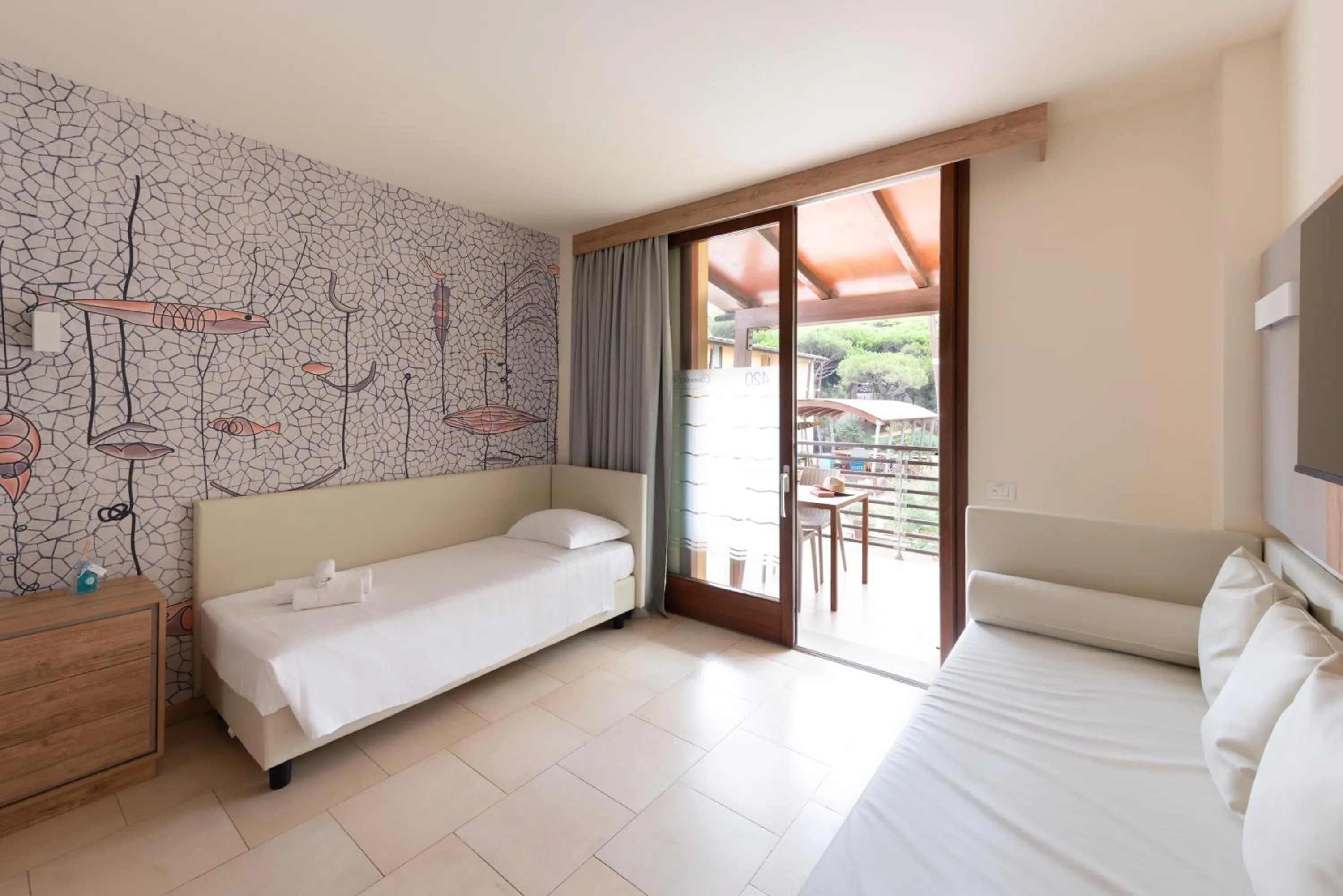 Living room, Bed in Canado Family Hotel