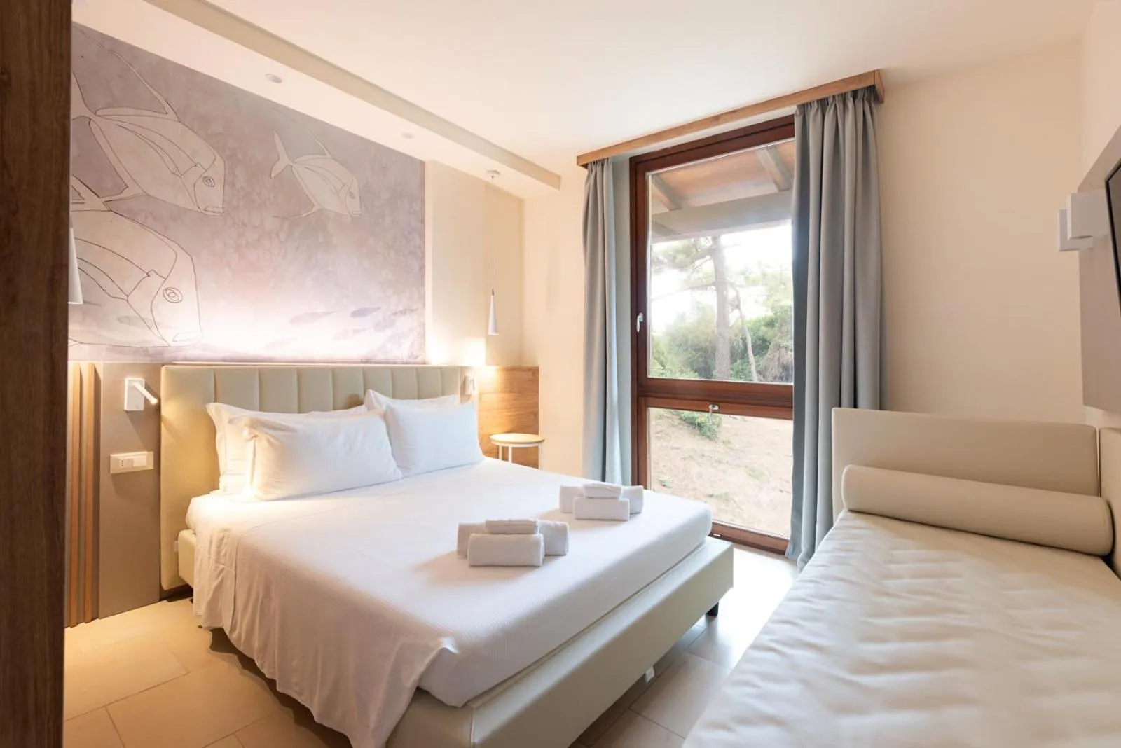 Bed in Canado Family Hotel