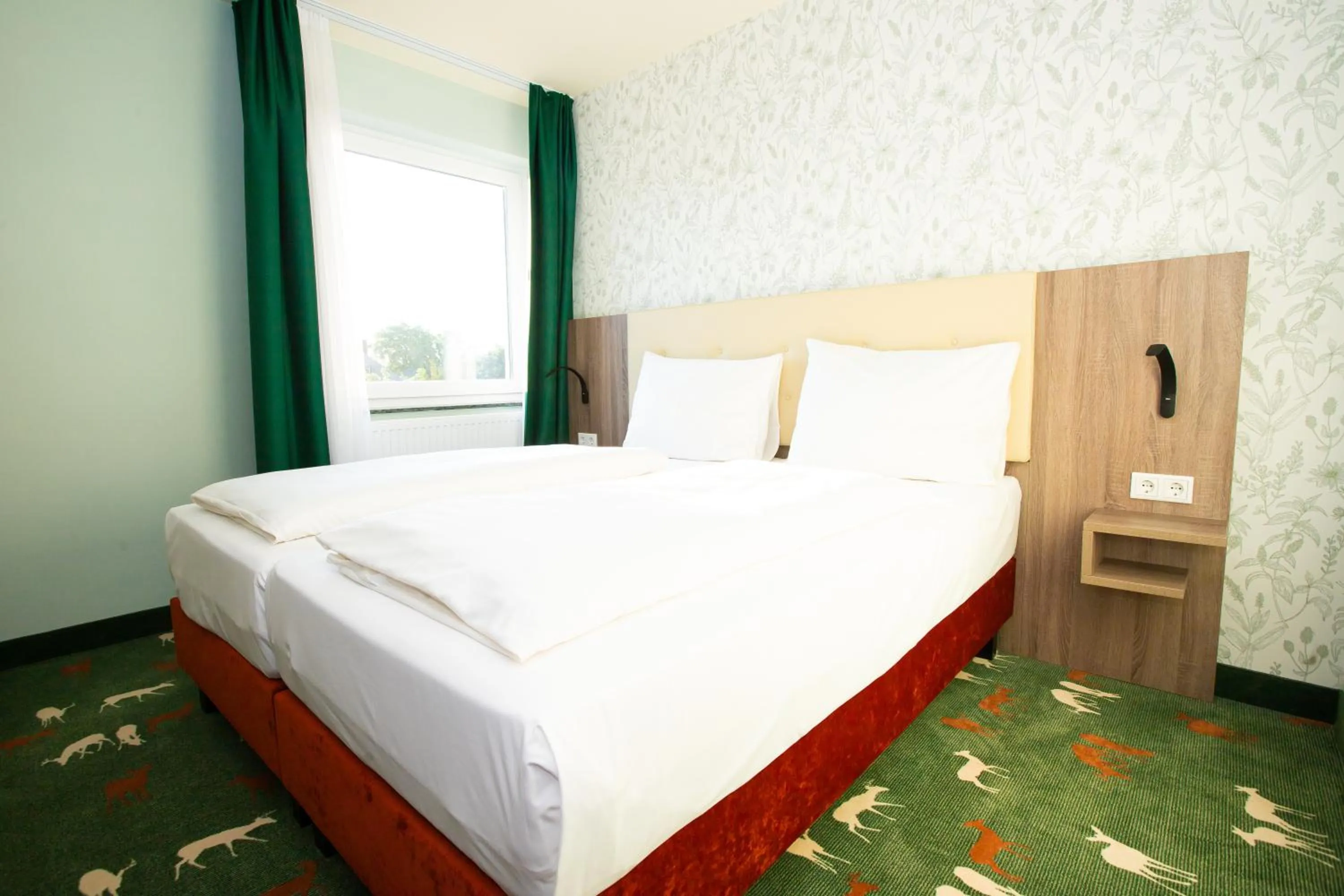 Bed in Hotel & Restaurant Hubertus Sehnde