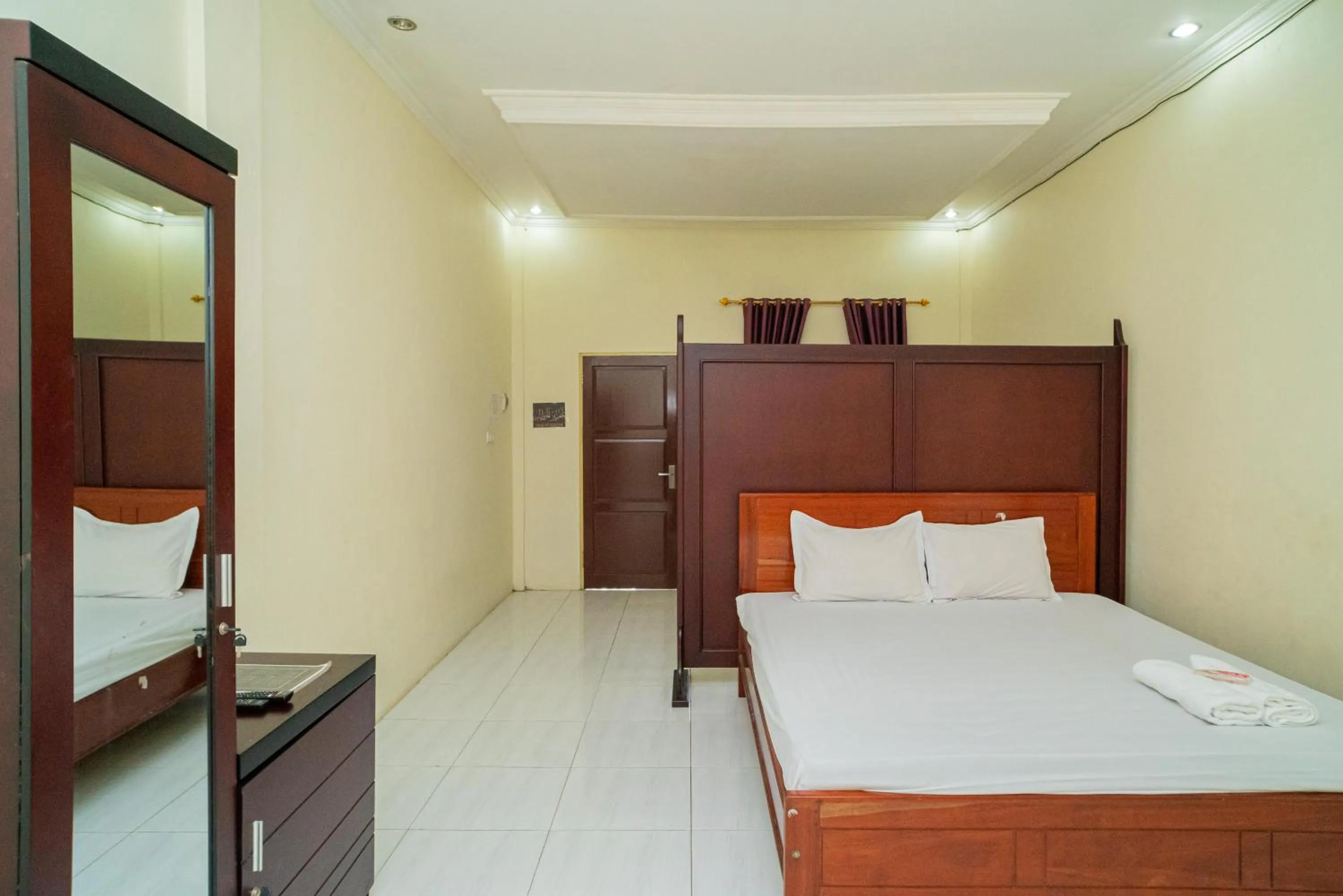 Bed in RedDoorz Syariah @ Jalan Bukit Kaminting 2