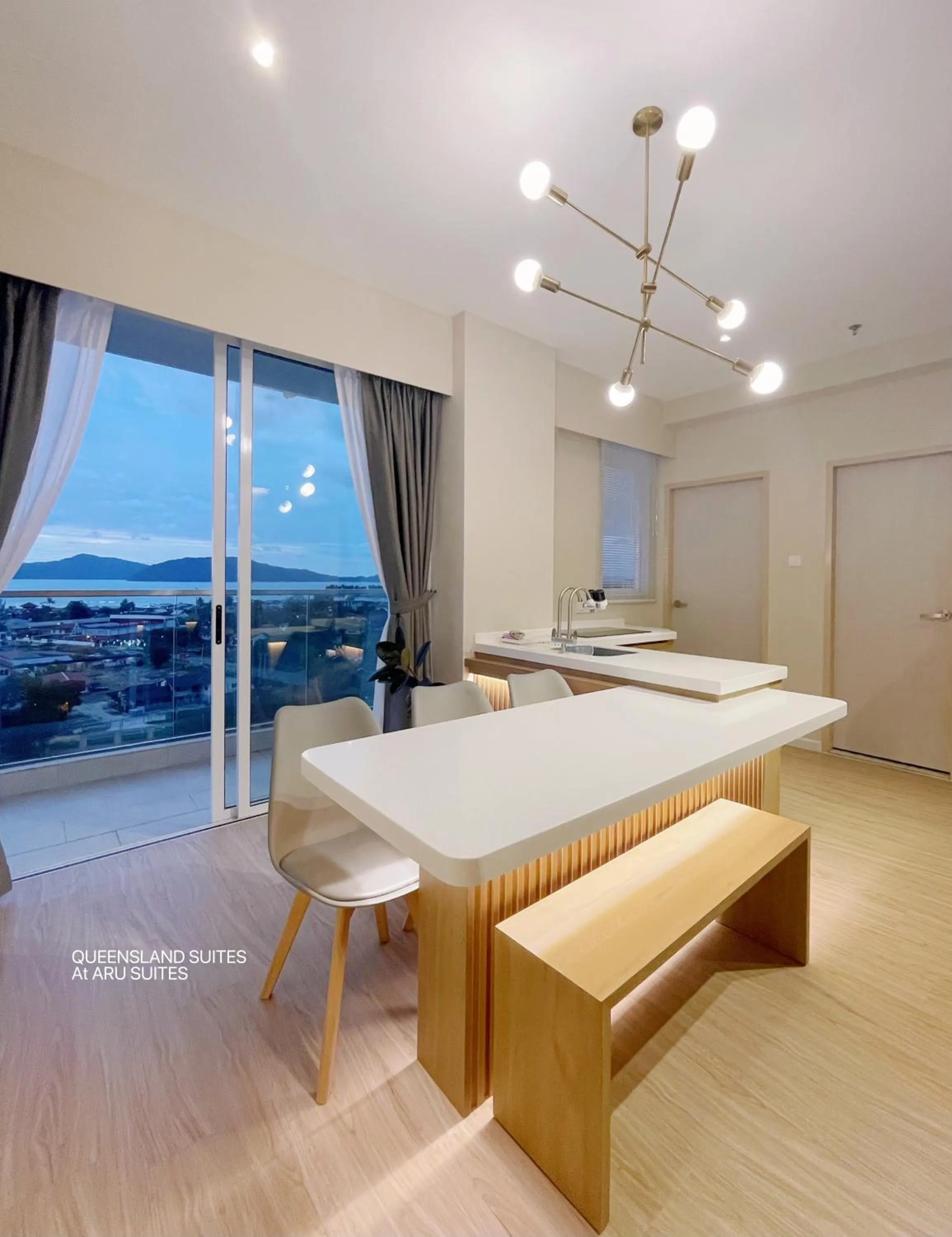 Kitchen or kitchenette in QUEENSLAND SUITES at Aru Suites, Kota Kinabalu