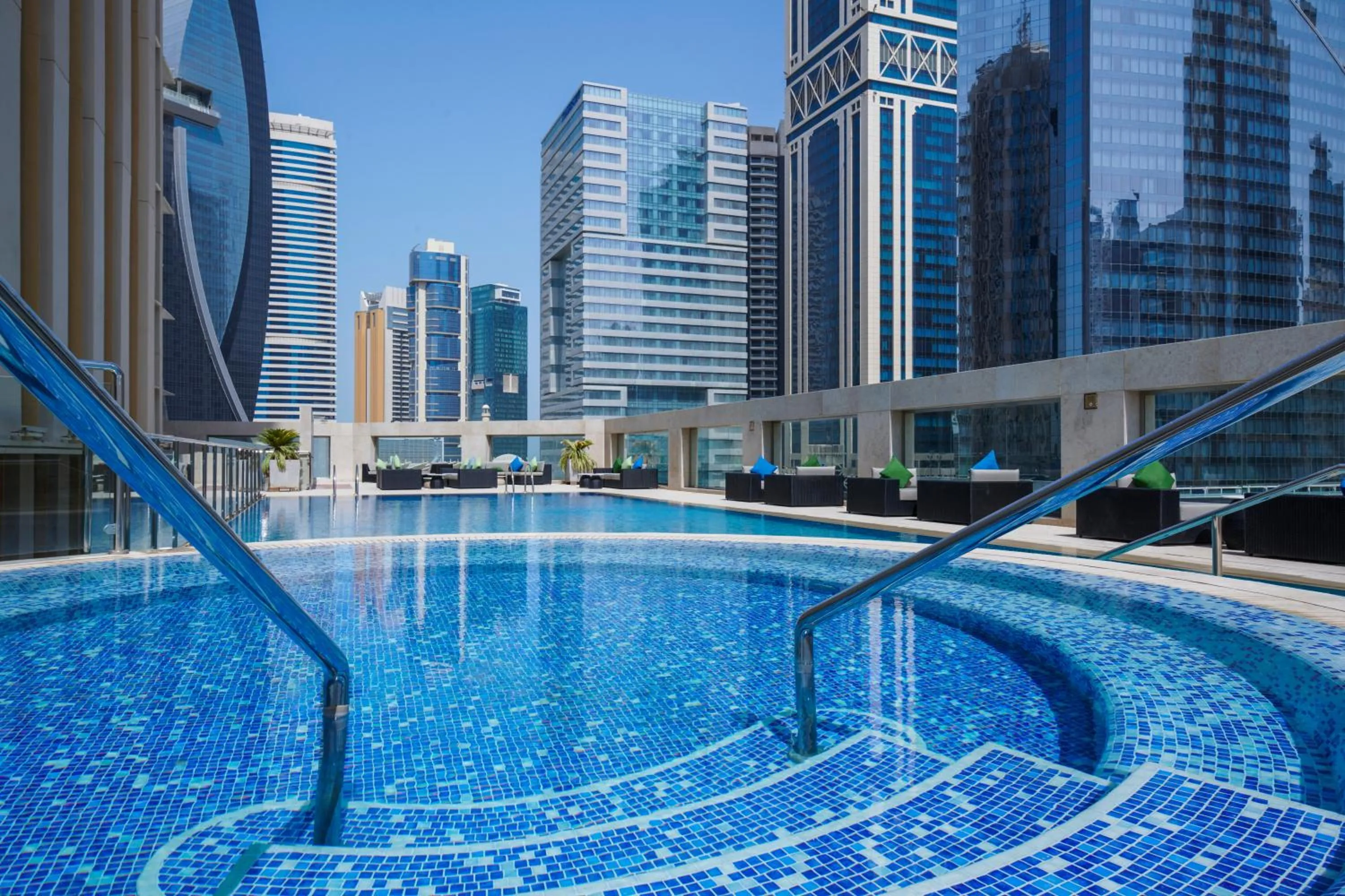 Swimming pool in Wyndham Grand Doha West Bay Beach