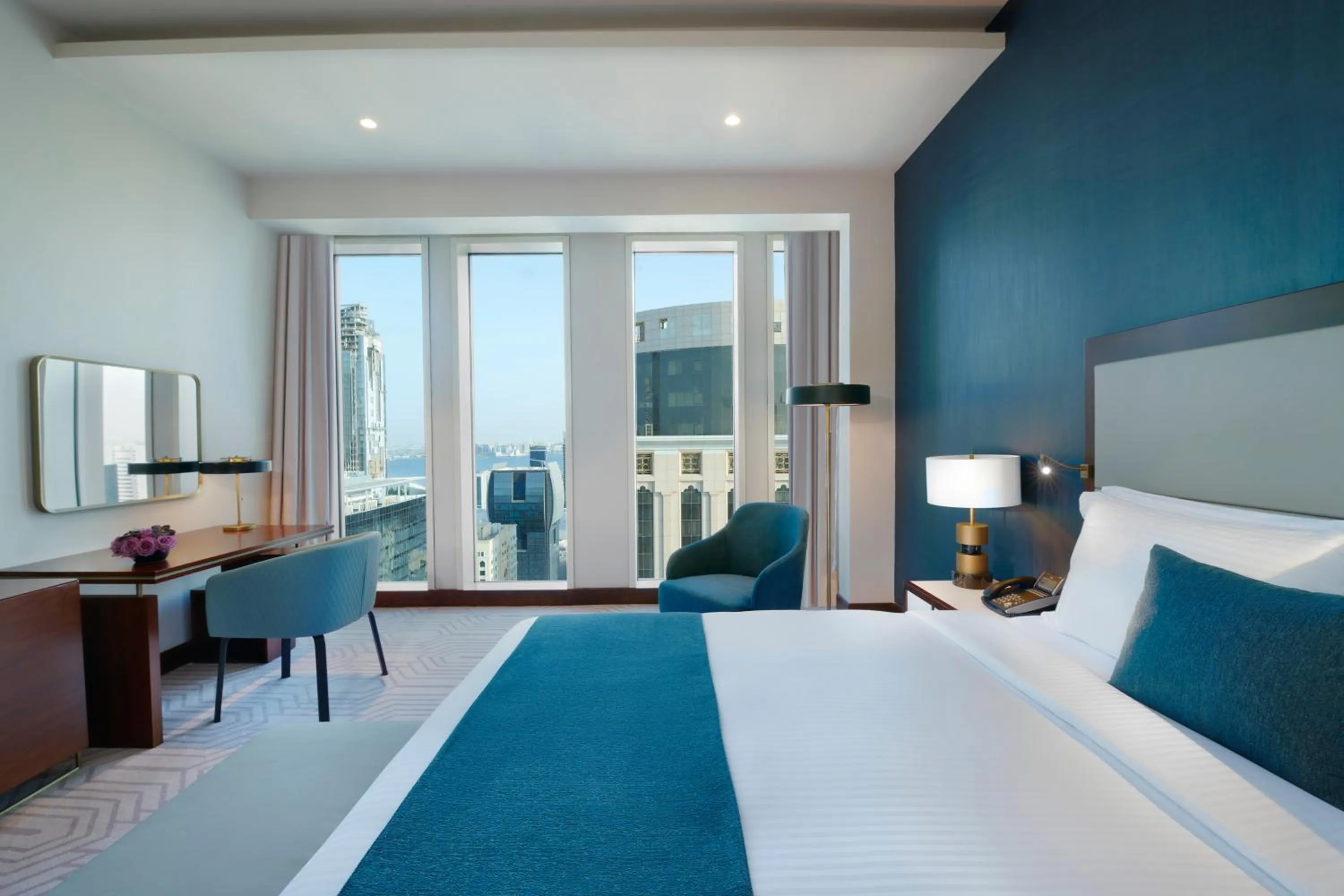 Photo of the whole room, Bed in Wyndham Grand Doha West Bay Beach