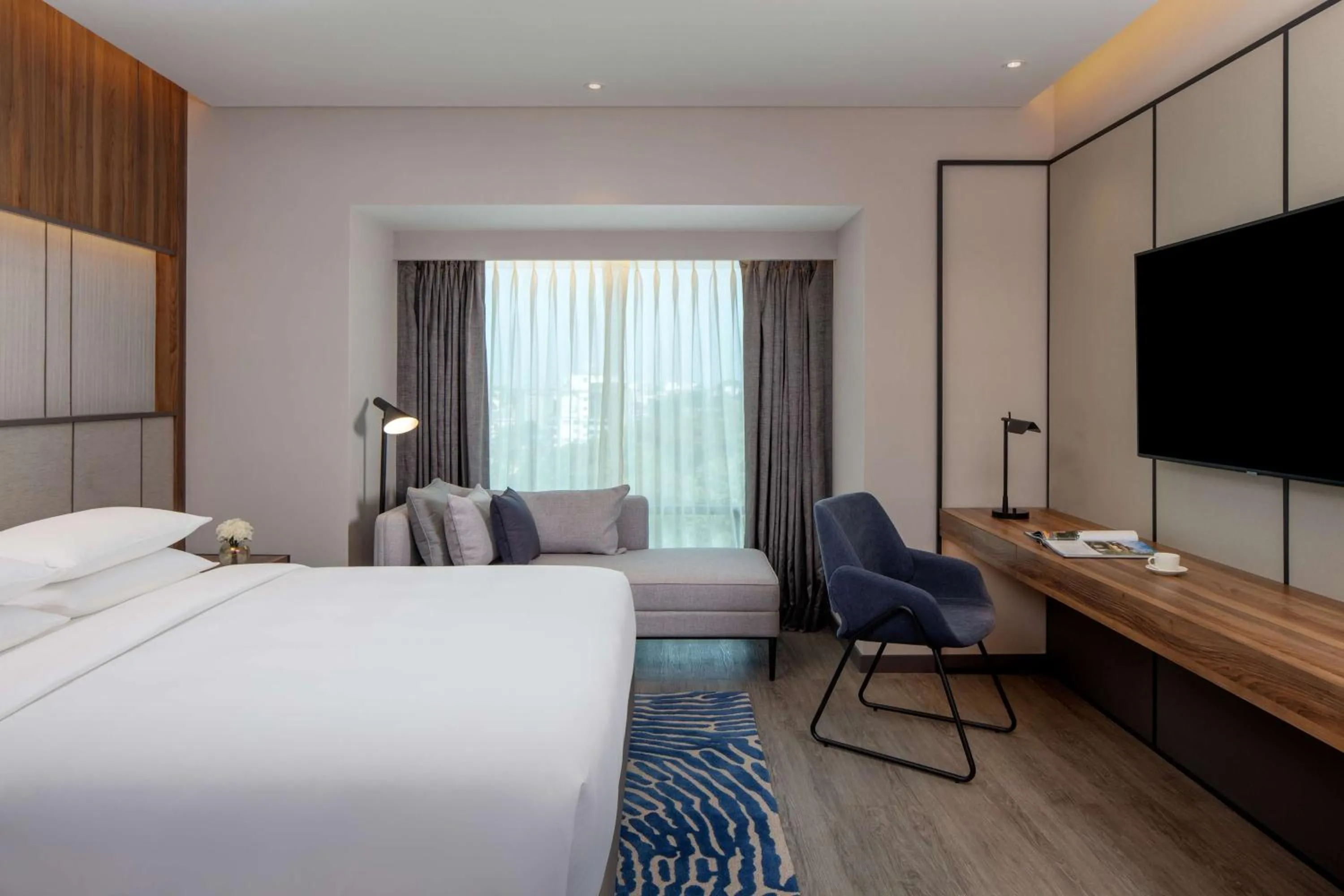 Photo of the whole room, Bed in Hyatt Regency Trivandrum