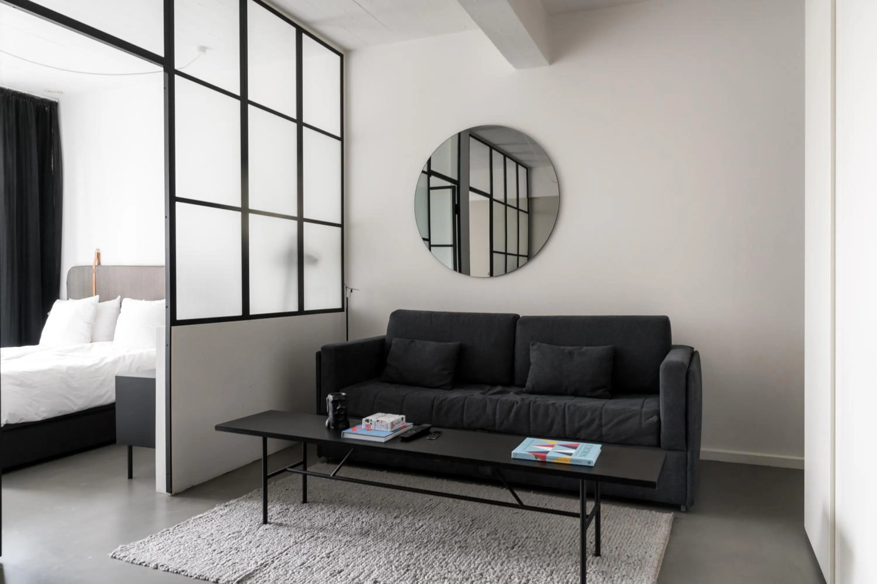 Living room, Bed in The Pier Ateliers by Daniel&Jacob's