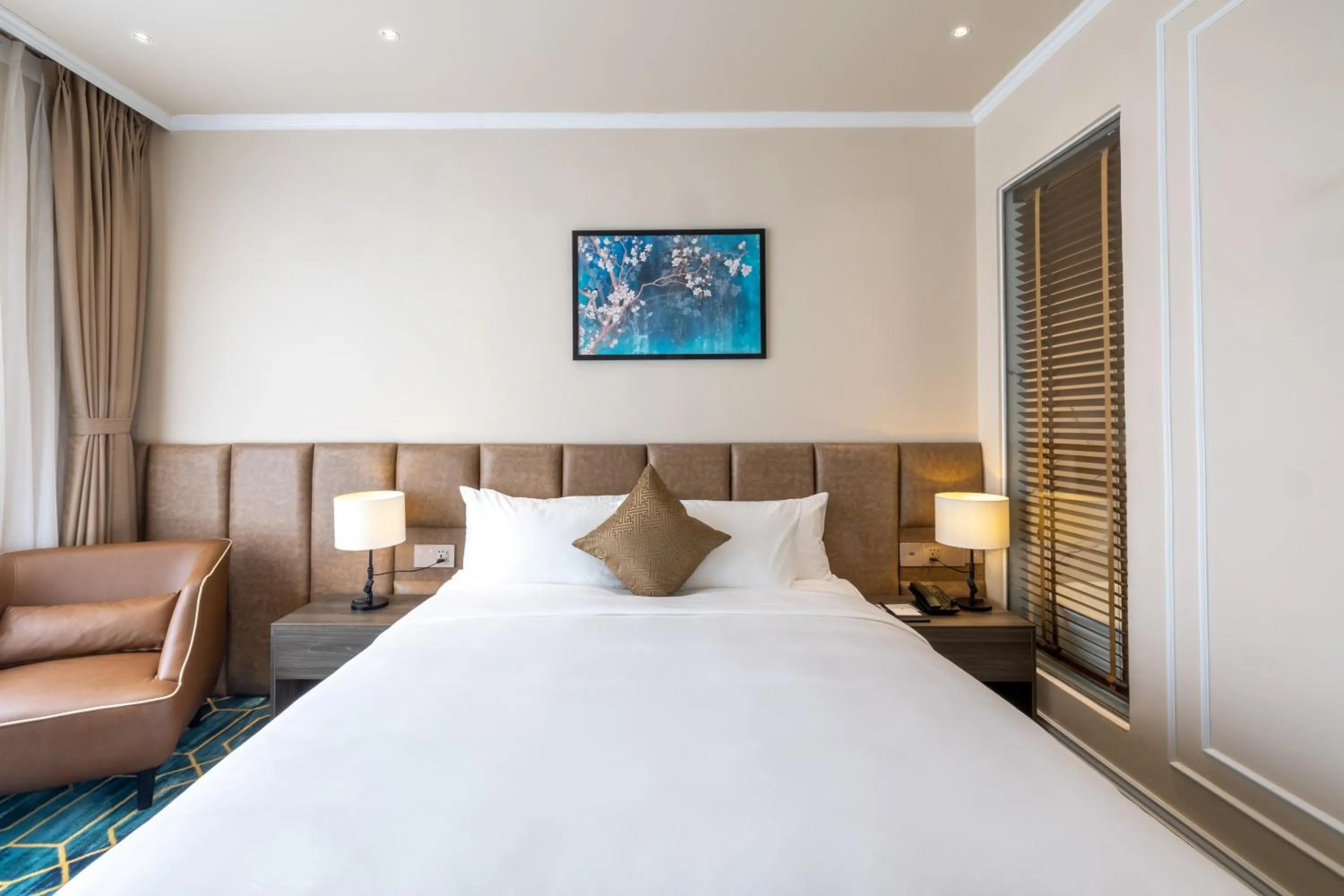 Bed in La Vela Hue Hotel