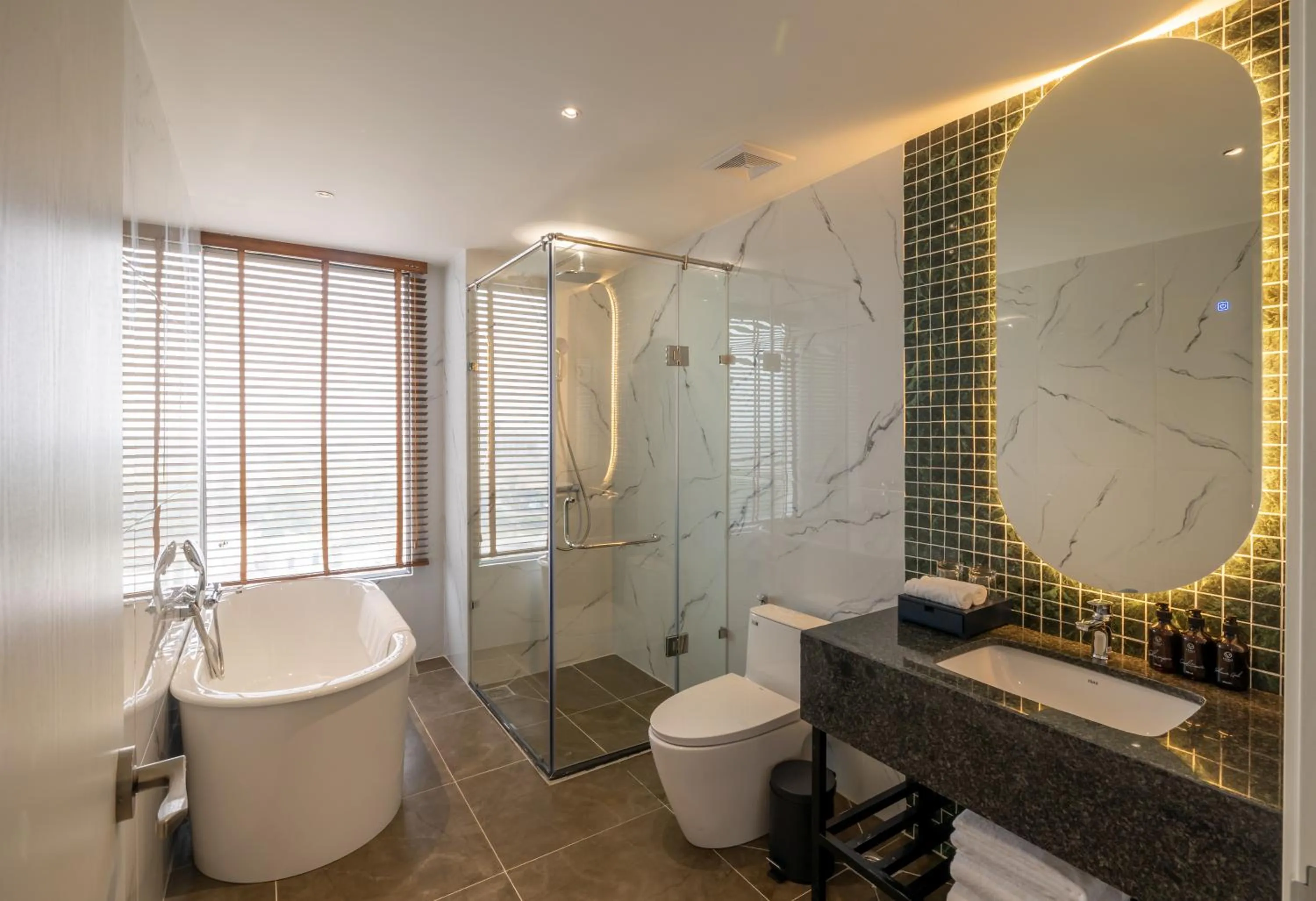 Bathroom in La Vela Hue Hotel