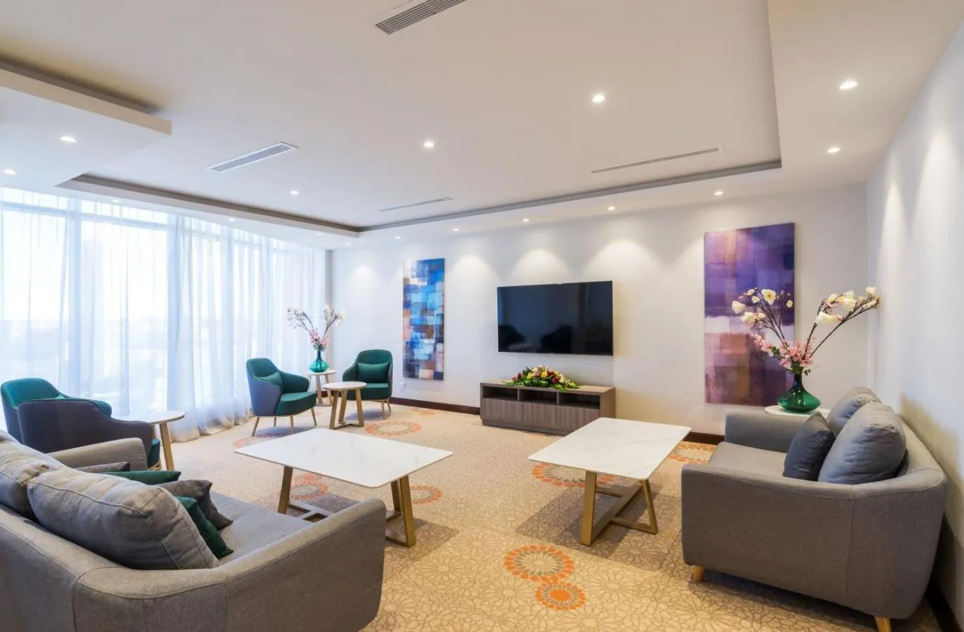Communal lounge/ TV room in Best Western Plus Al Qurayyat City Center