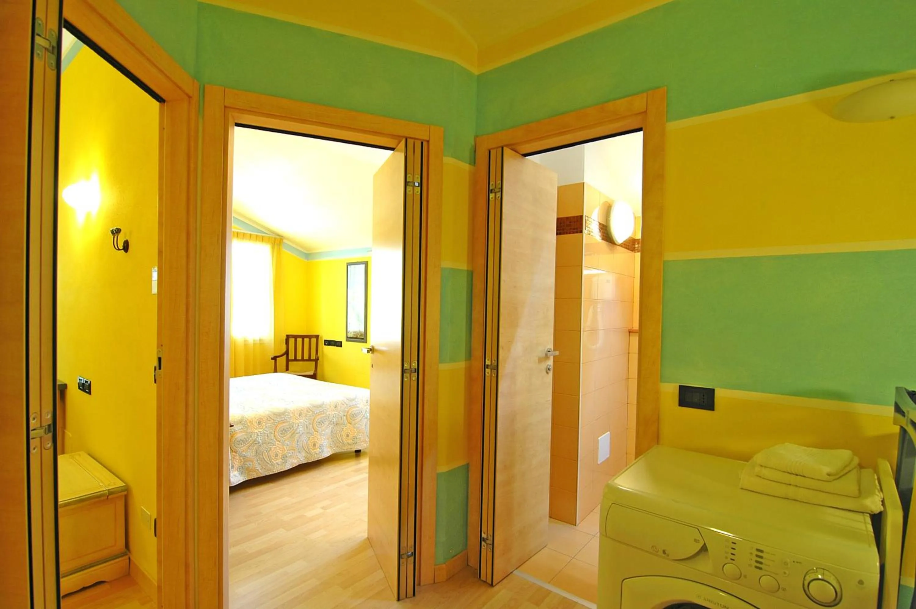 Bathroom, Bed in World Village Apartments