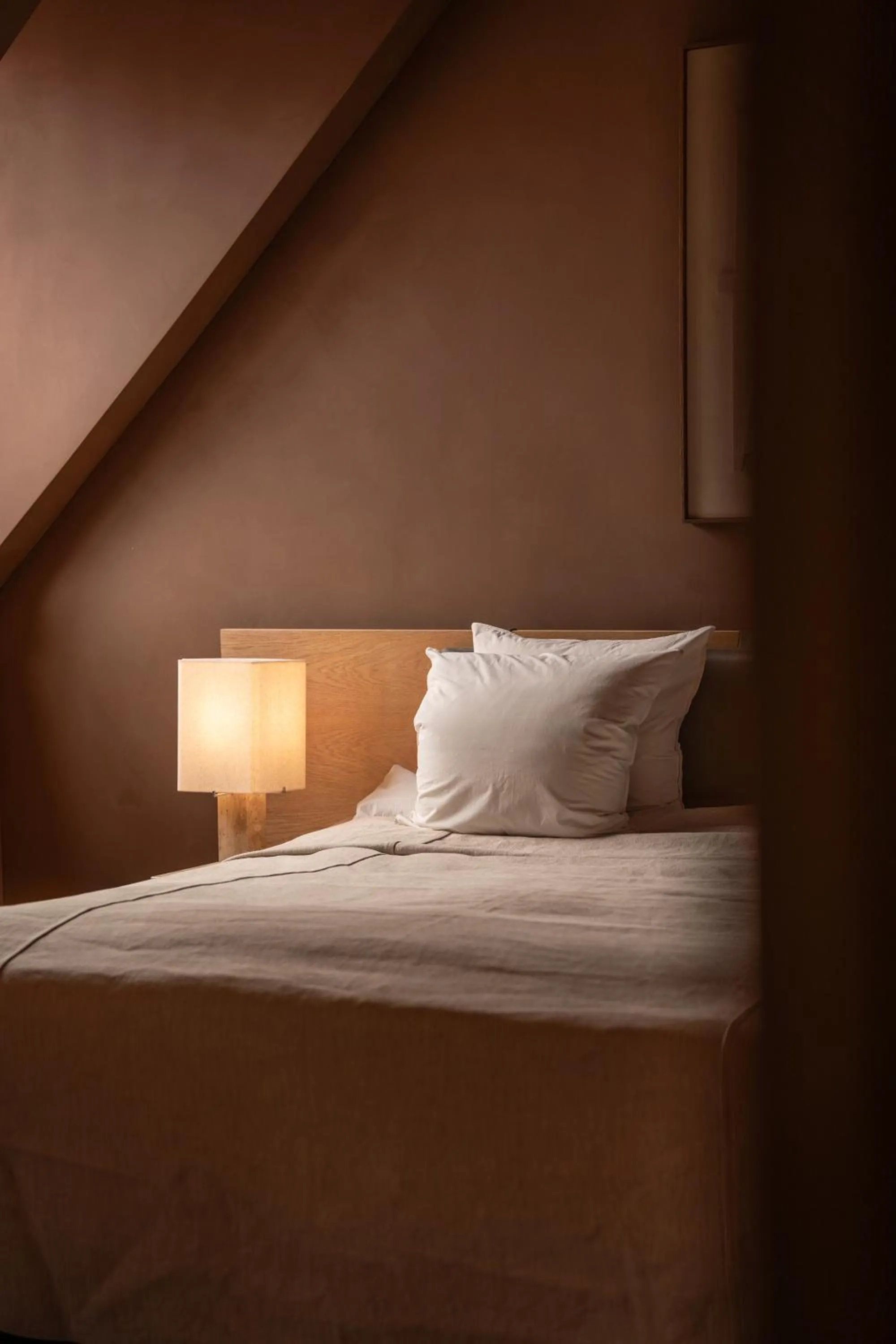 Bed in Audo Boutique Hotel