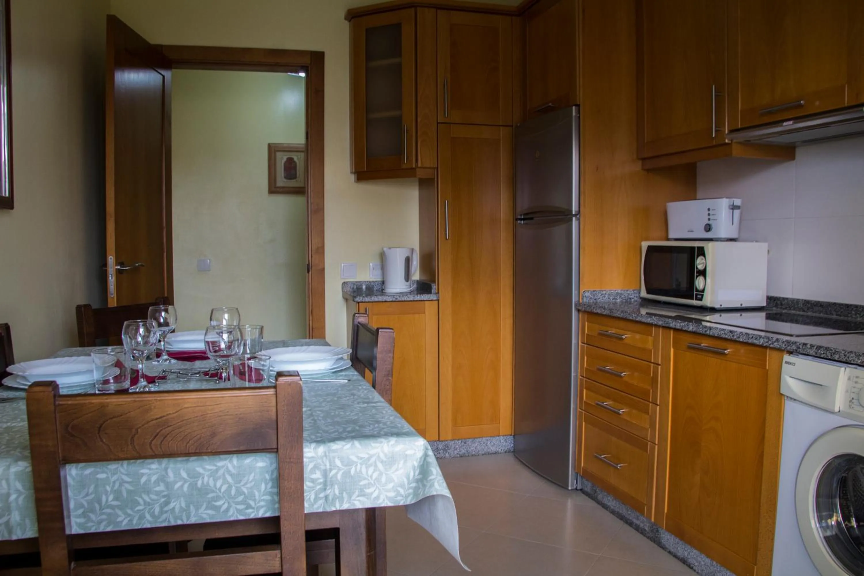 Communal kitchen in Apartamentos Vista Mar