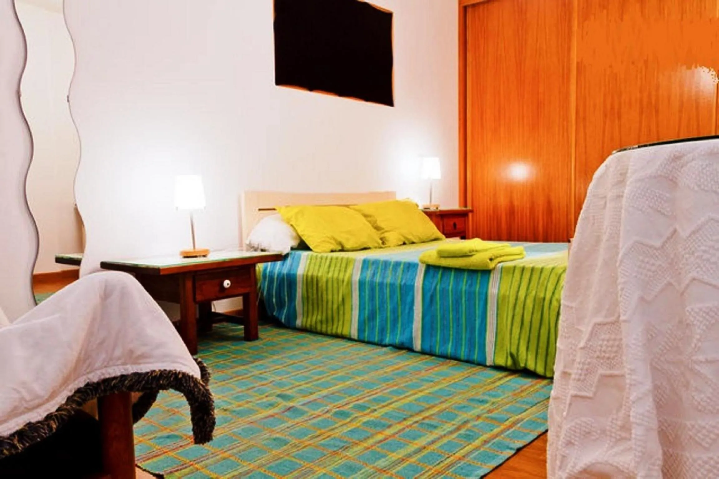 Photo of the whole room, Bed in Coloured Studio