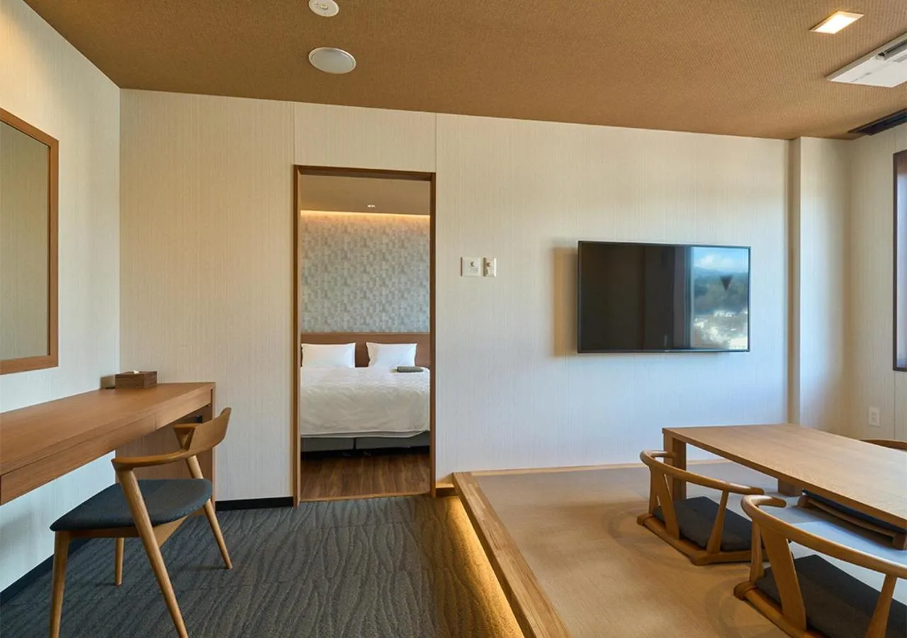 Living room, Bed in Hotel and Spa Gift TAKAYAMA