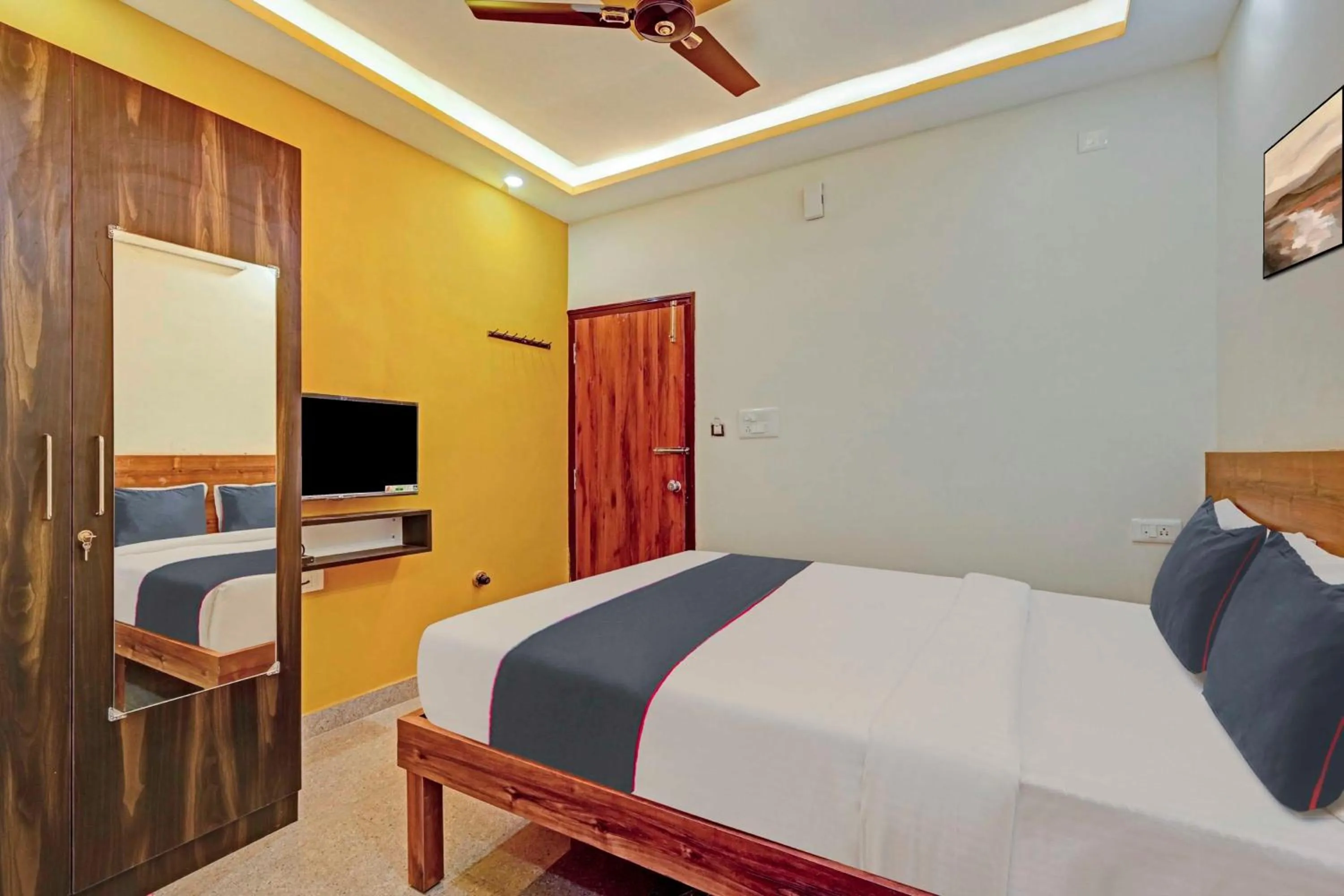 Bedroom, Bed in Super Hotel O Sri Sapthagiri Comforts