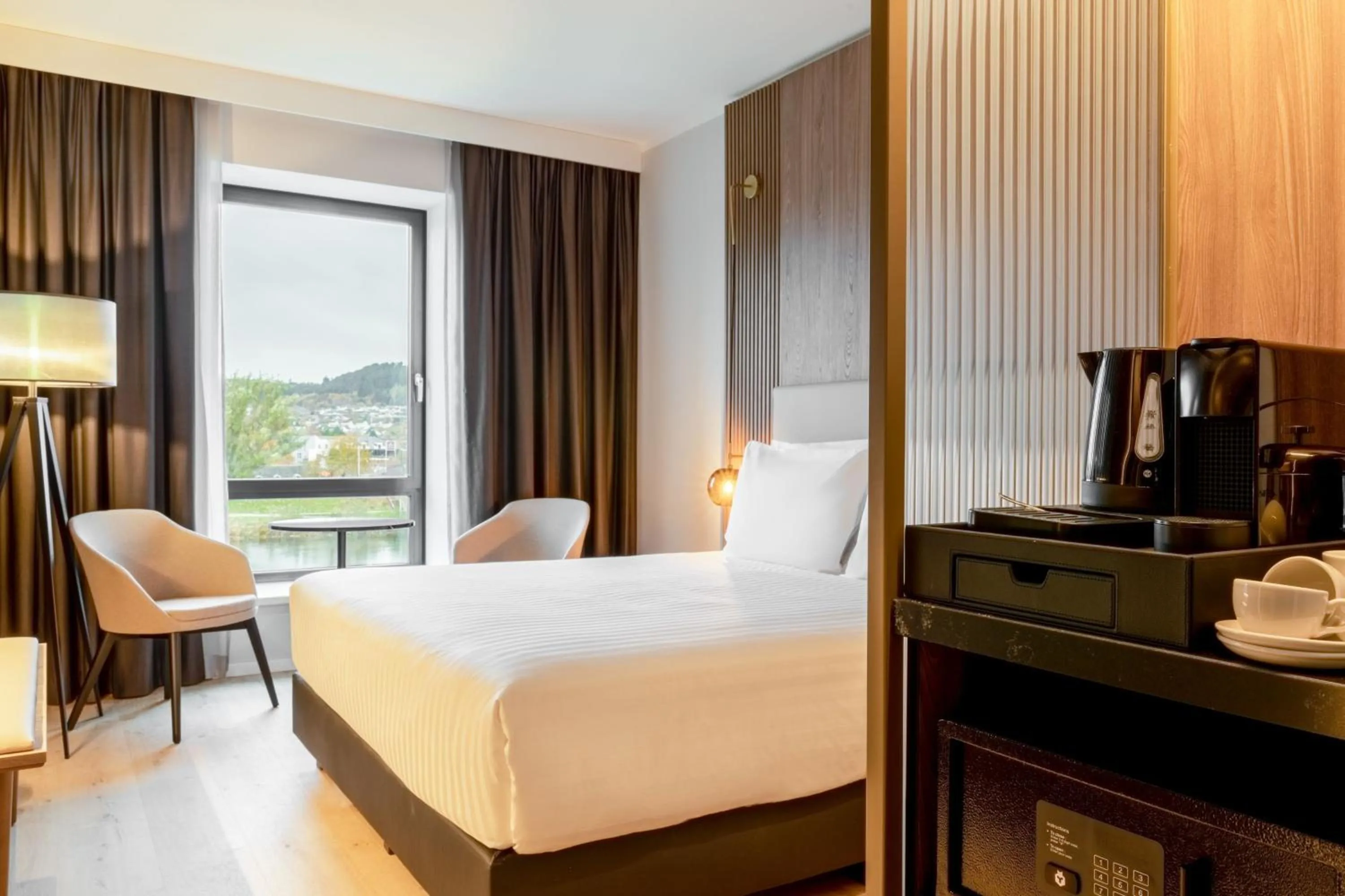 Photo of the whole room, Bed in AC Hotel by Marriott Inverness