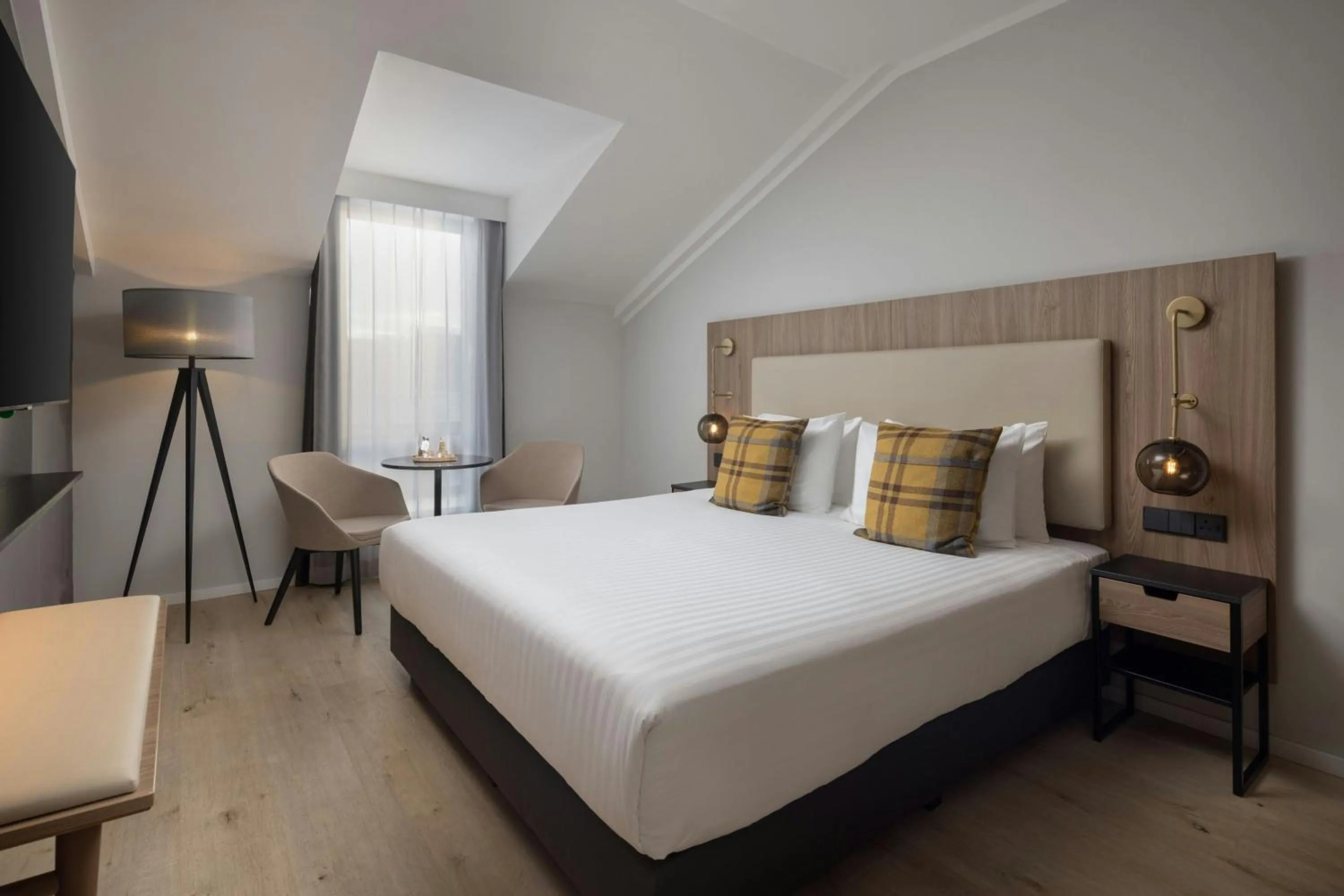 Photo of the whole room, Bed in AC Hotel by Marriott Inverness