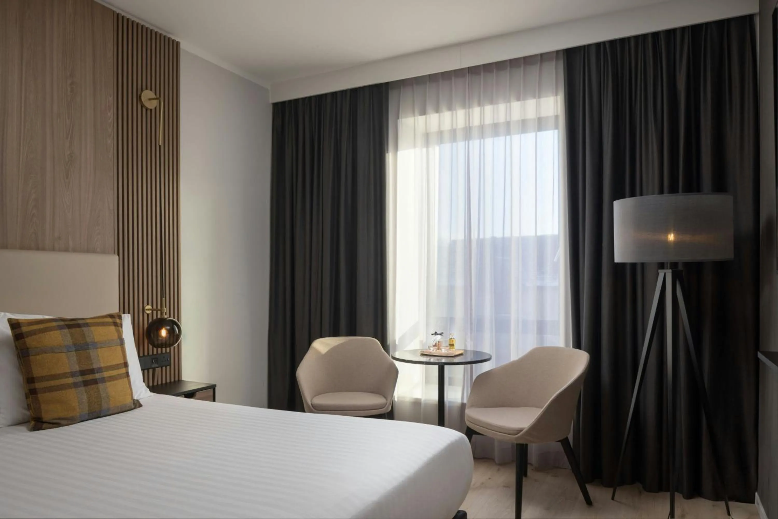 Photo of the whole room, Bed in AC Hotel by Marriott Inverness