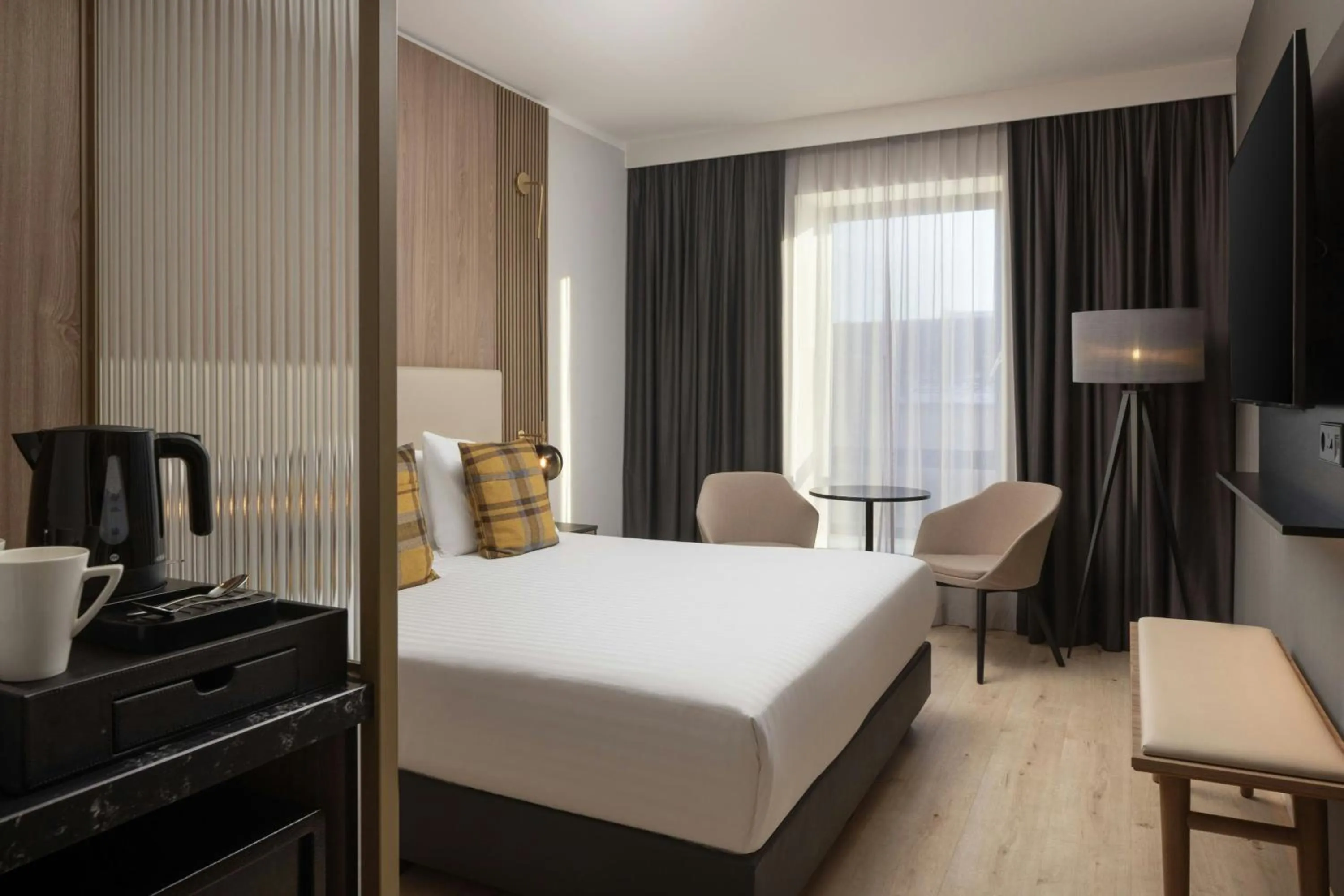 Photo of the whole room, Bed in AC Hotel by Marriott Inverness