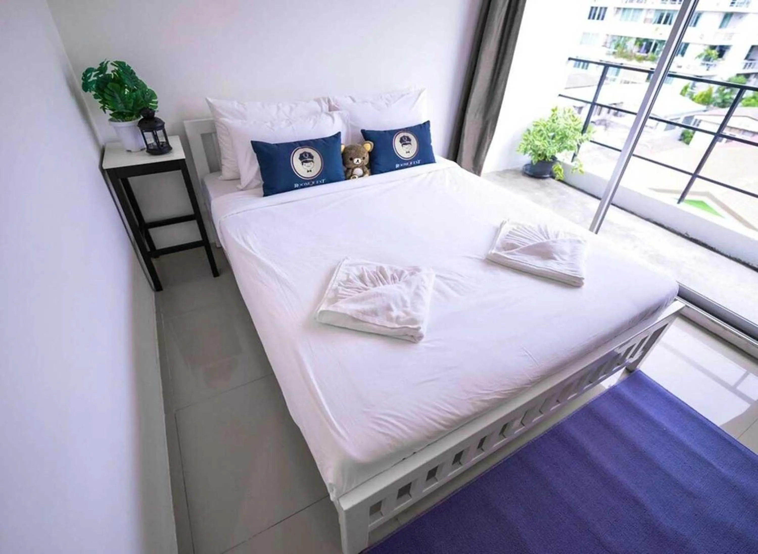 Bed in RQ Bangkok Sukhumvit 50 by Collection O