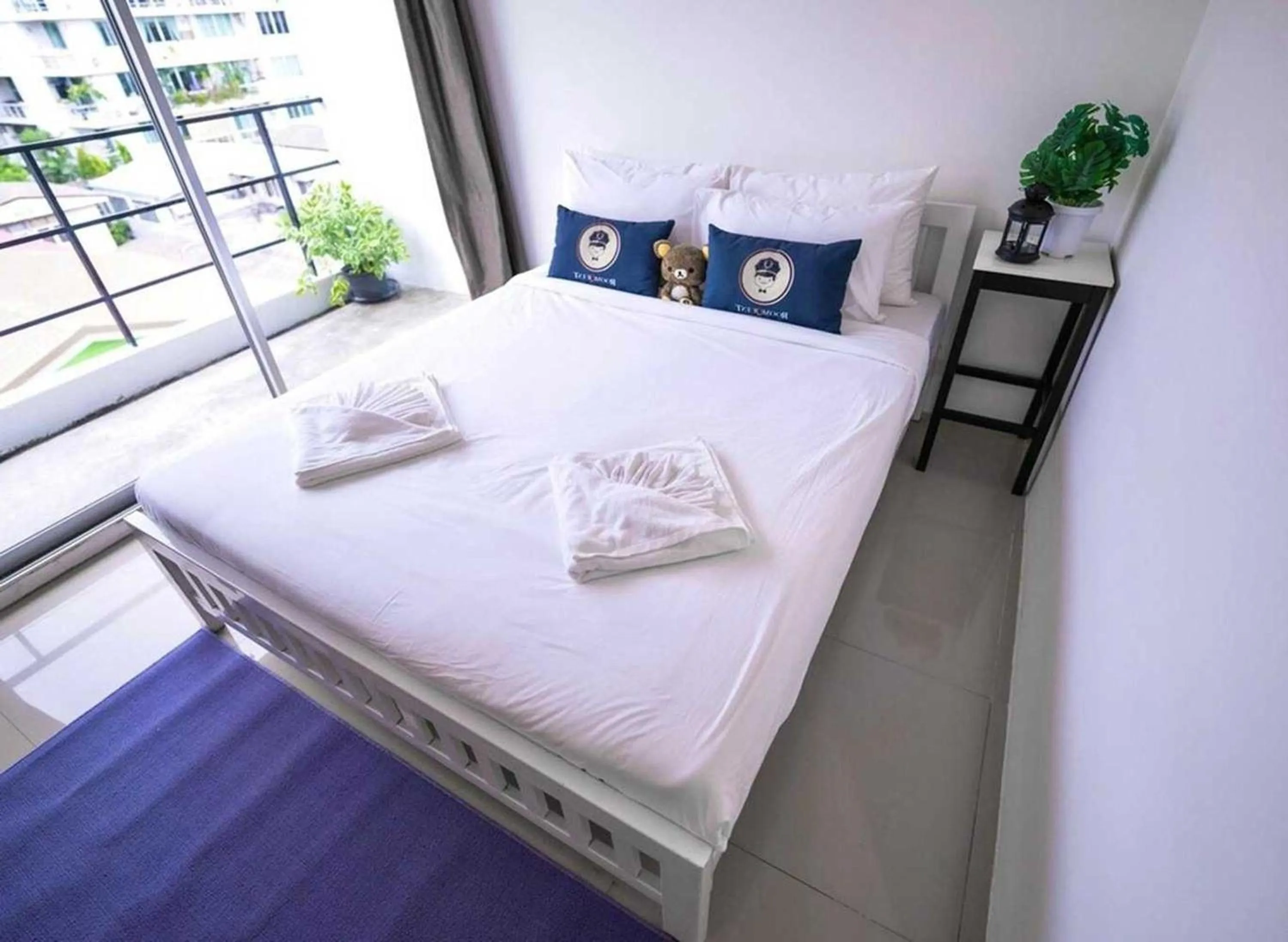 Bed in RQ Bangkok Sukhumvit 50 by Collection O