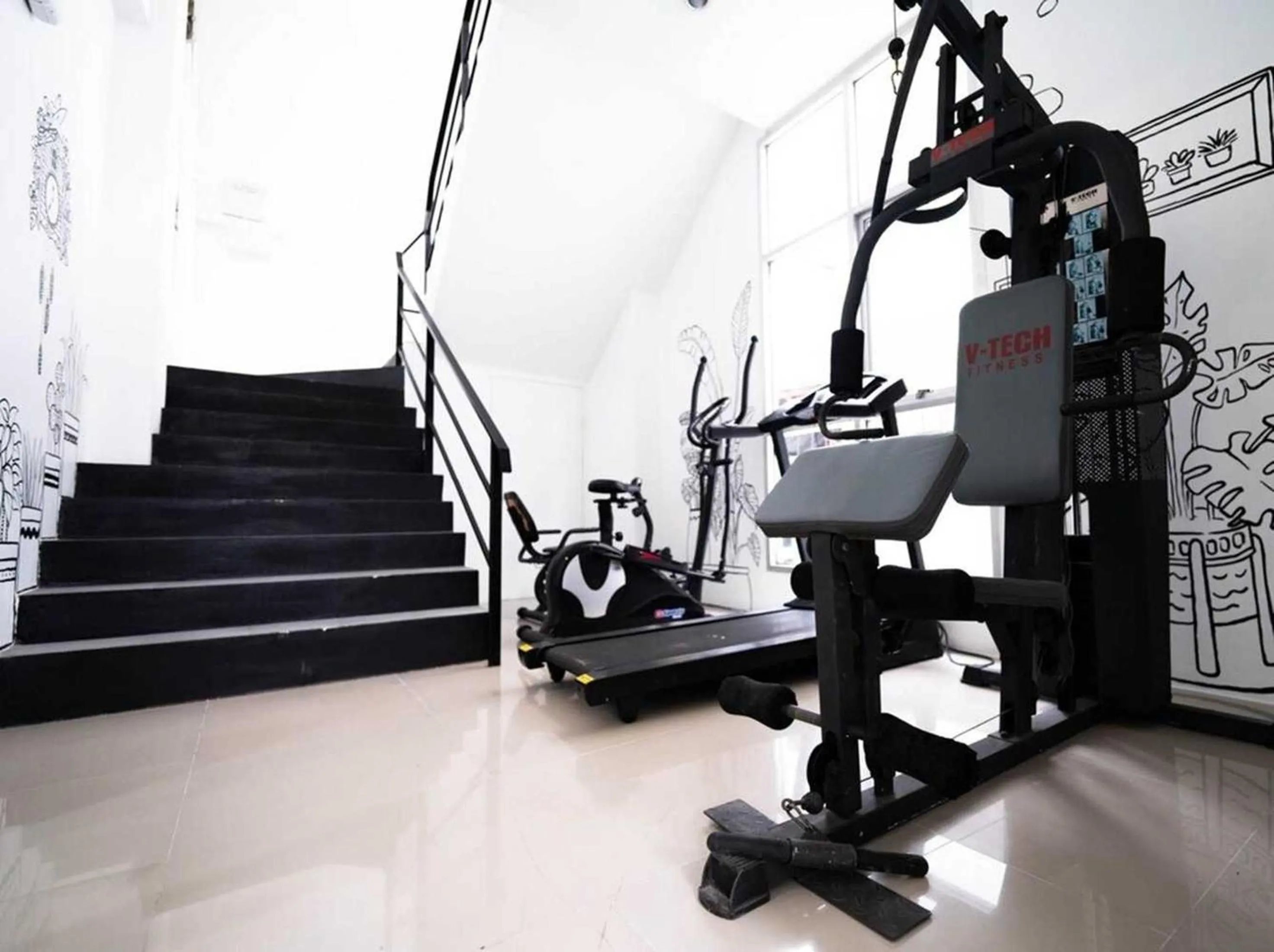 Fitness centre/facilities in RQ Bangkok Sukhumvit 50 by Collection O