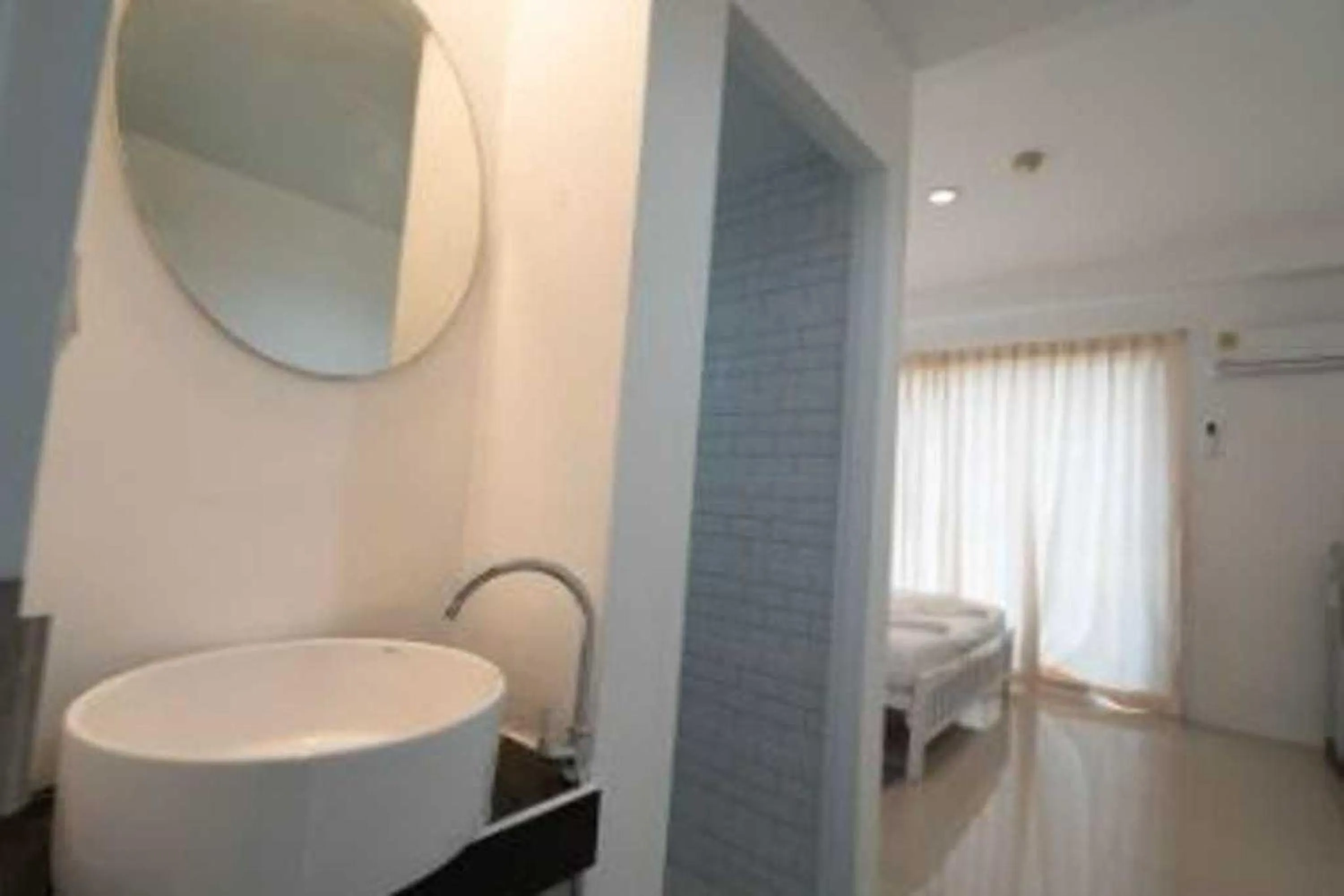Bathroom in RQ Bangkok Sukhumvit 50 by Collection O