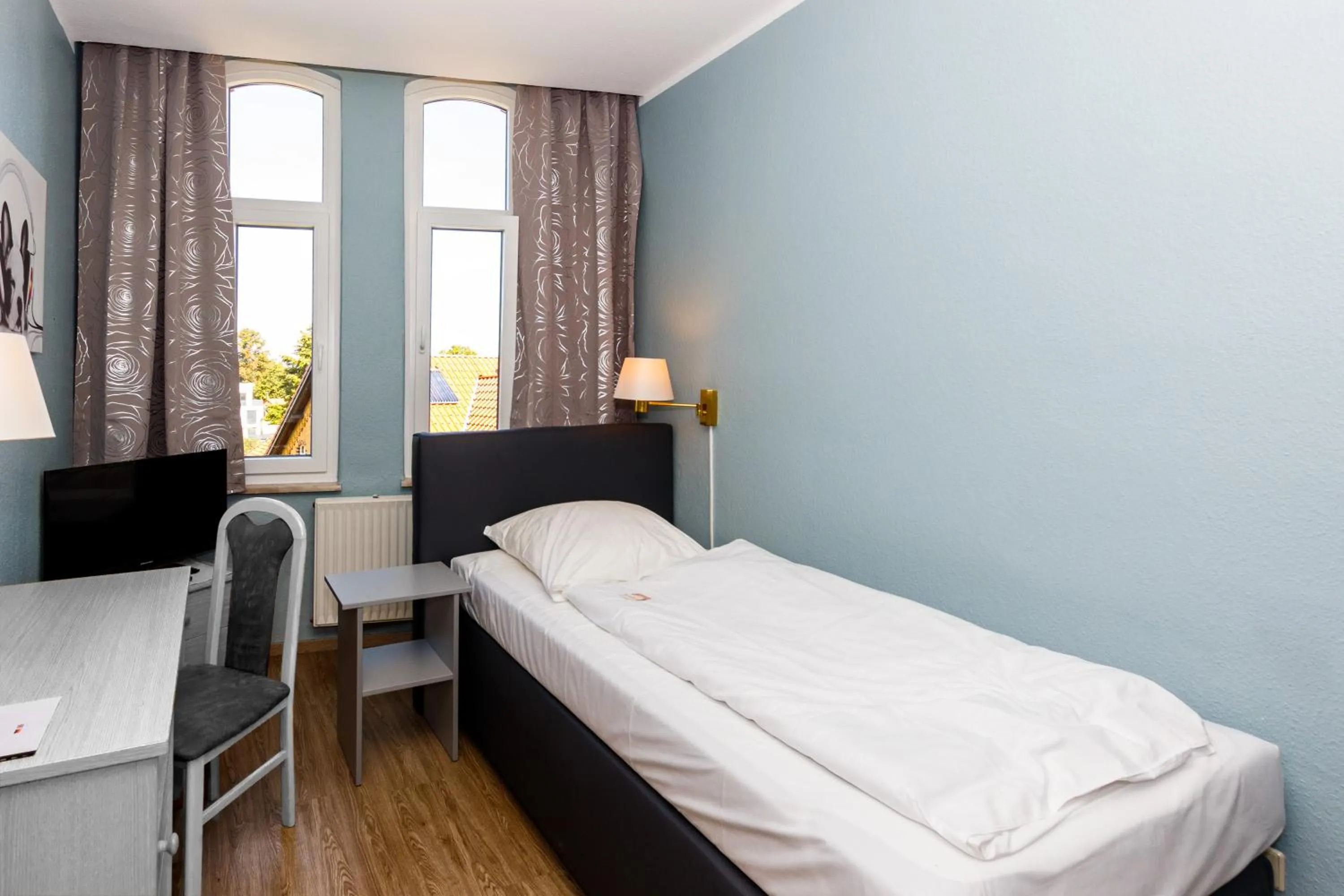 Bed in Apart Hotel Sarstedter Hof