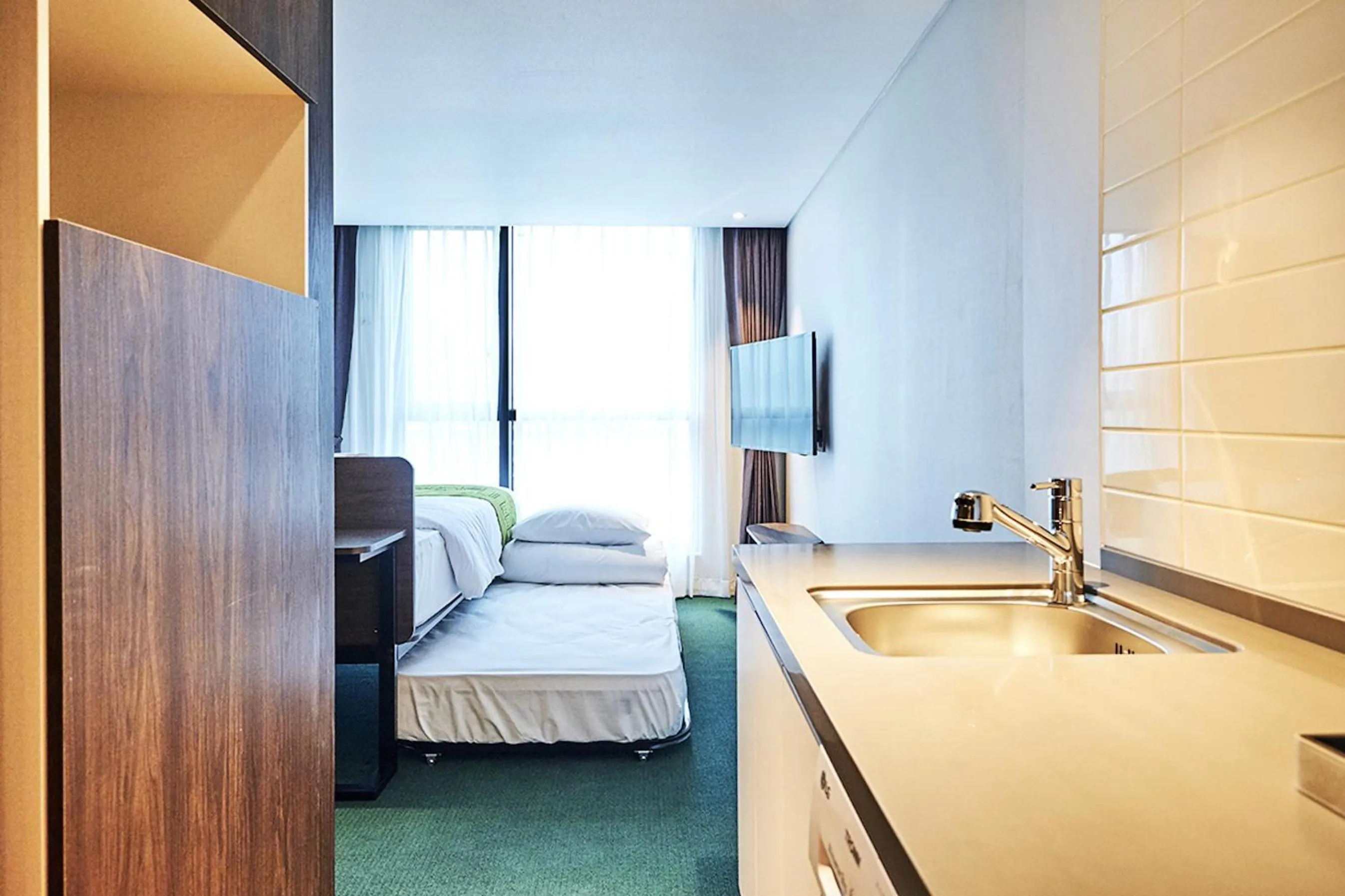 Bed in Jeju Pureun Hotel