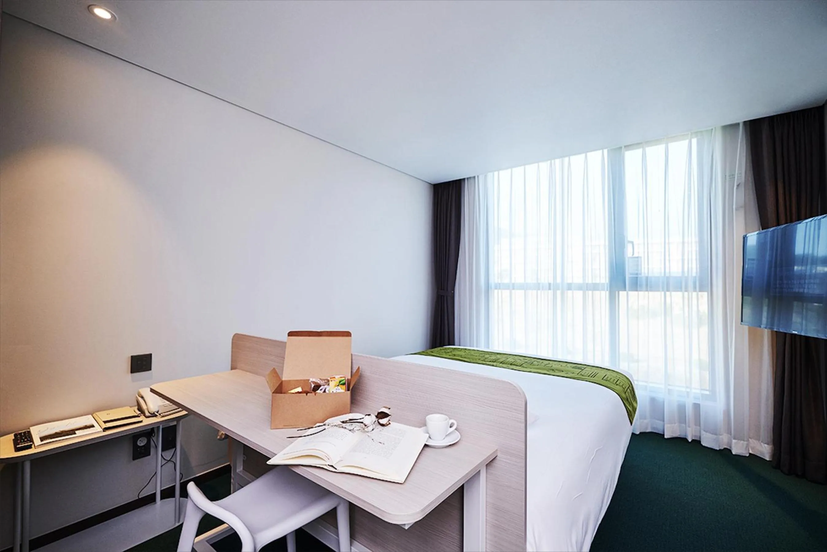 Bed in Jeju Pureun Hotel